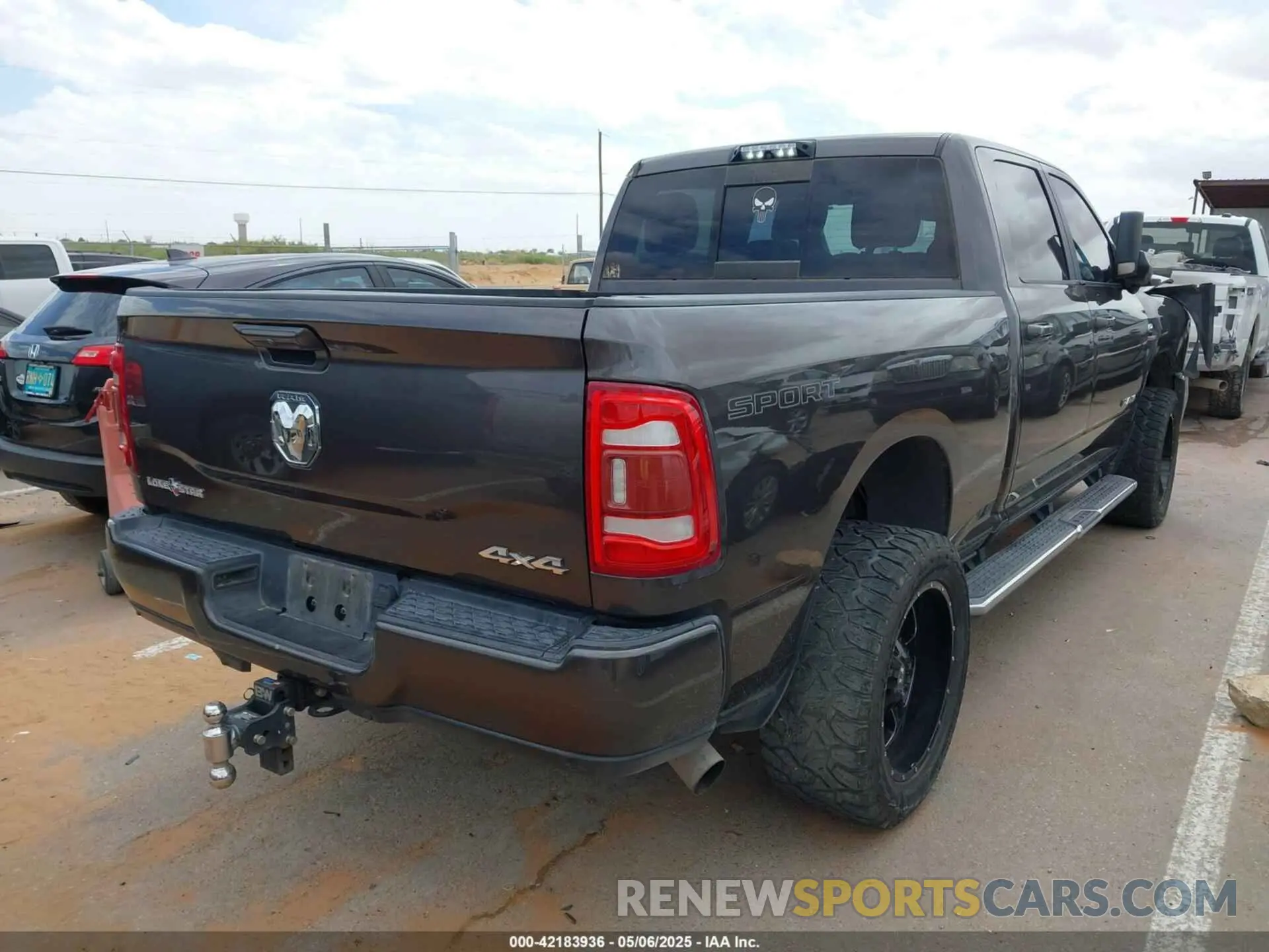 4 Photograph of a damaged car 3C6UR5DL9KG604368 RAM 2500 2019
