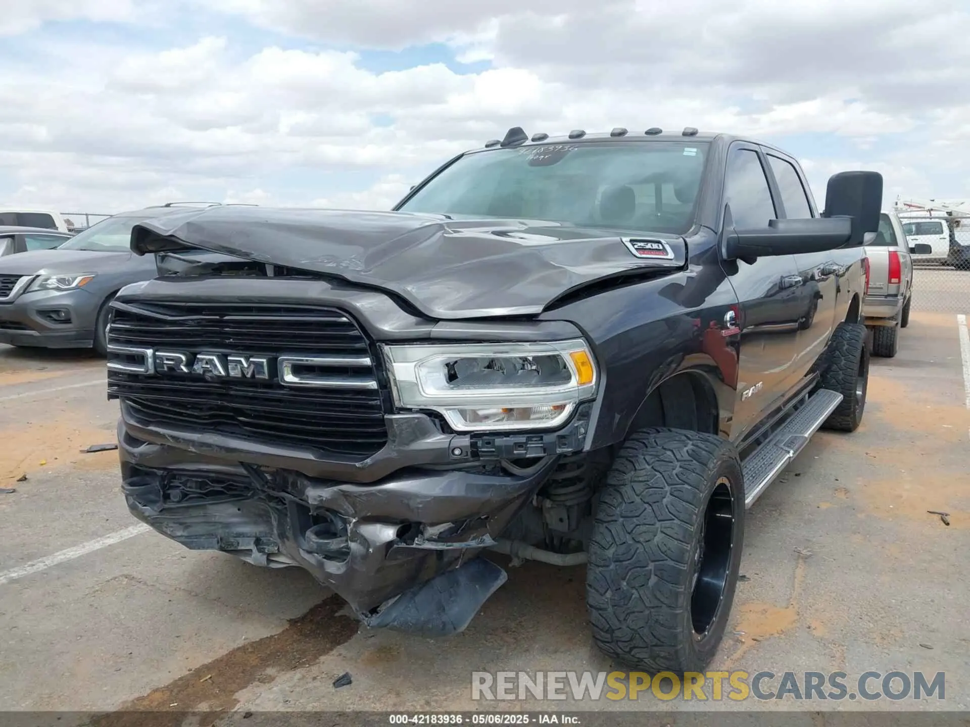 6 Photograph of a damaged car 3C6UR5DL9KG604368 RAM 2500 2019