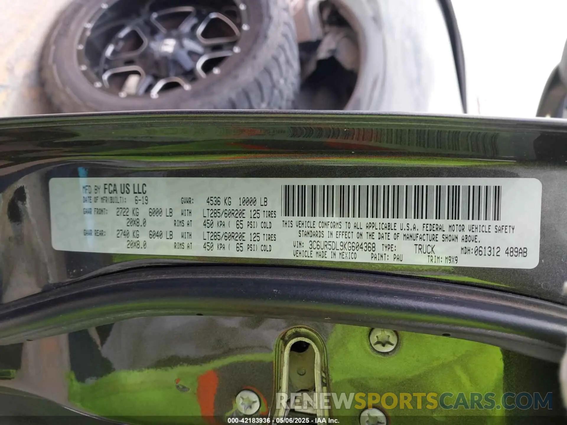 9 Photograph of a damaged car 3C6UR5DL9KG604368 RAM 2500 2019