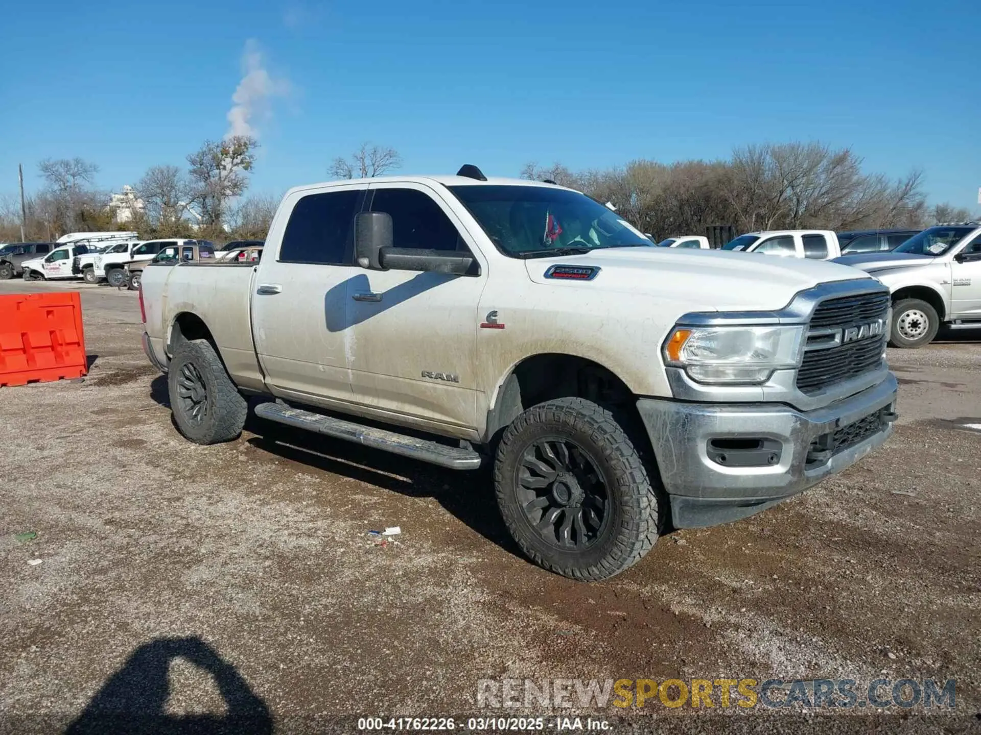 1 Photograph of a damaged car 3C6UR5DL9KG625821 RAM 2500 2019