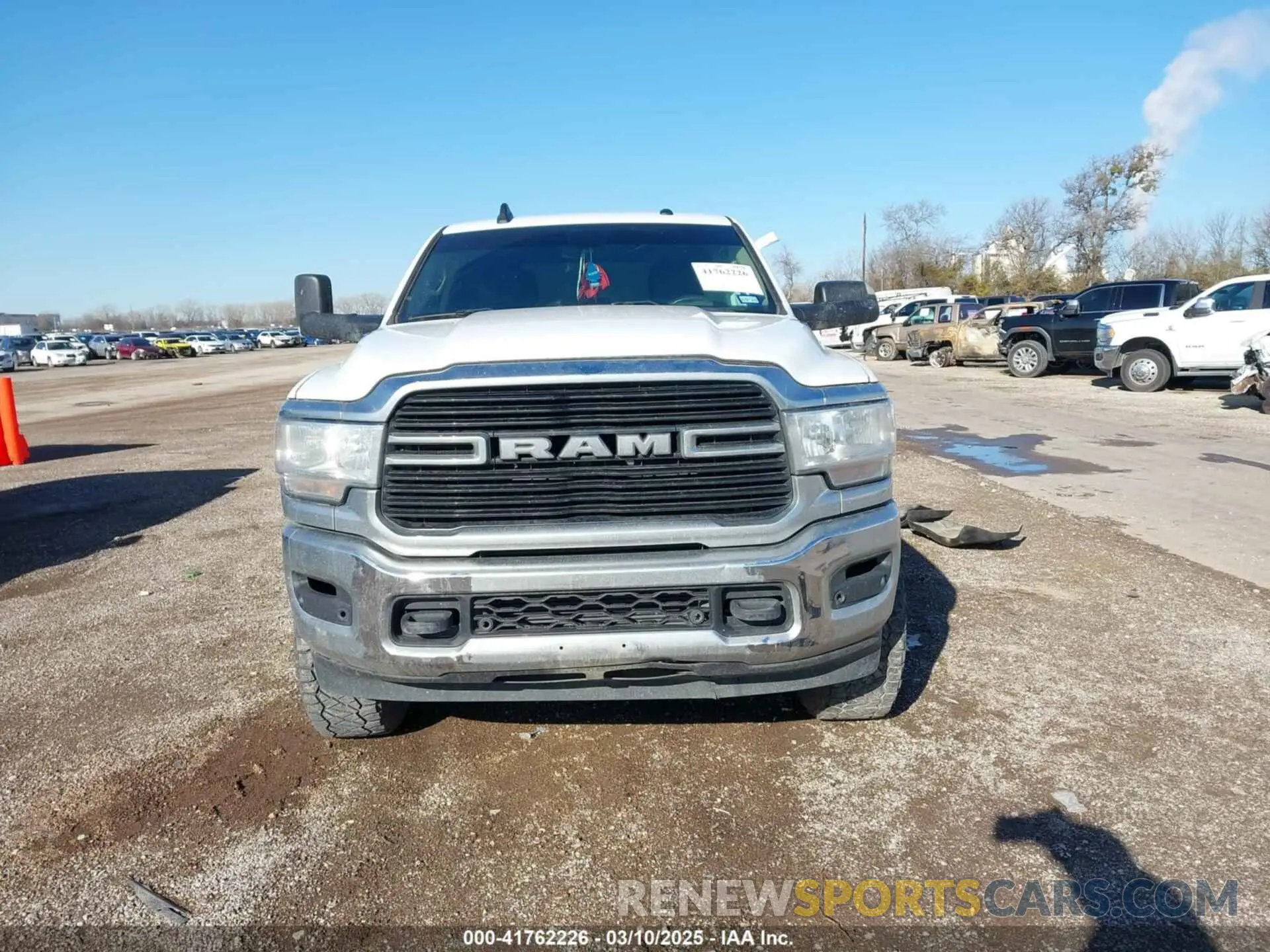 12 Photograph of a damaged car 3C6UR5DL9KG625821 RAM 2500 2019