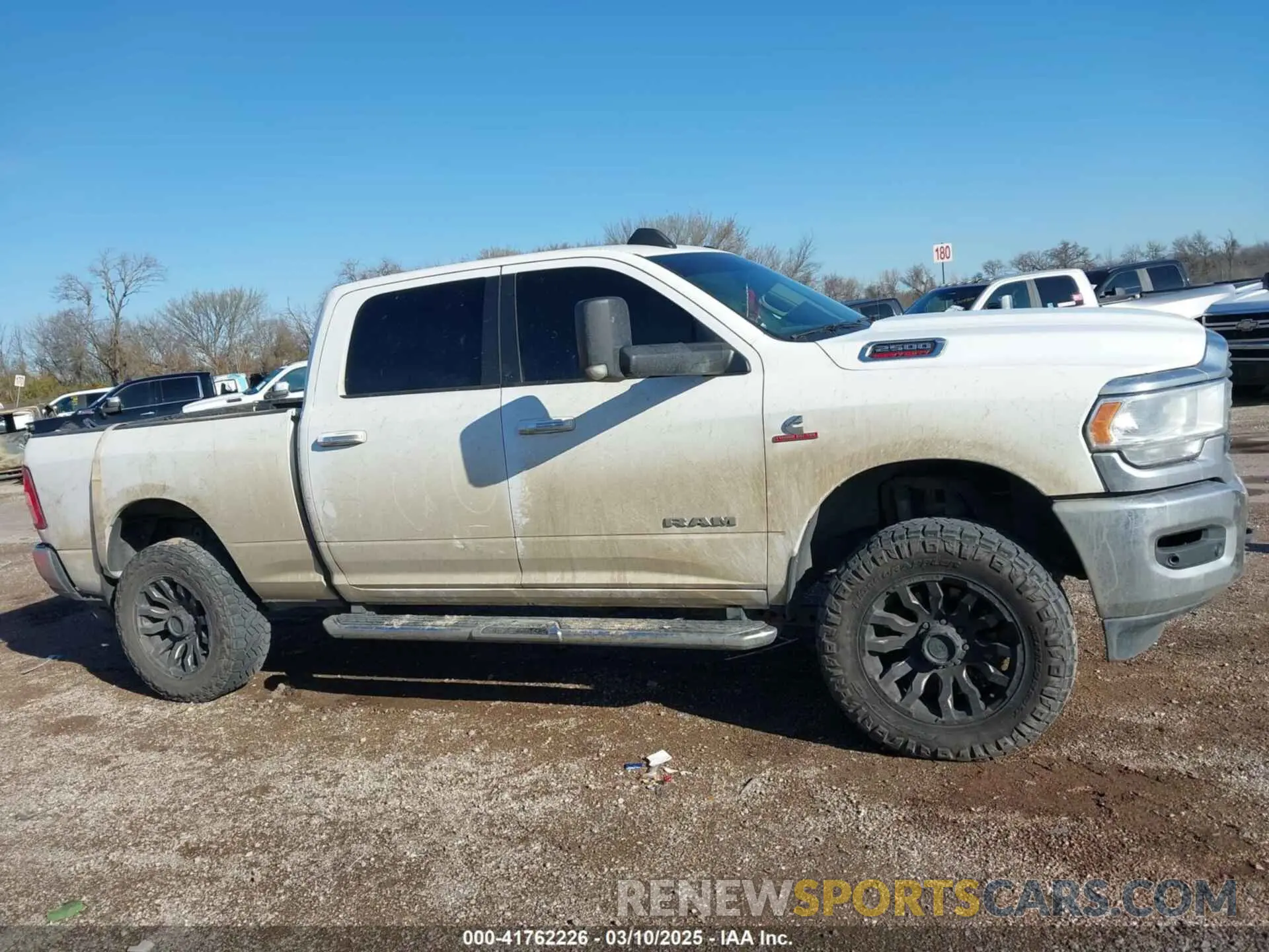 13 Photograph of a damaged car 3C6UR5DL9KG625821 RAM 2500 2019