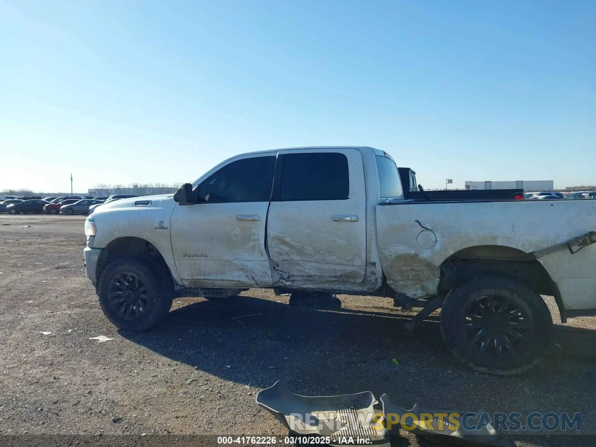 14 Photograph of a damaged car 3C6UR5DL9KG625821 RAM 2500 2019