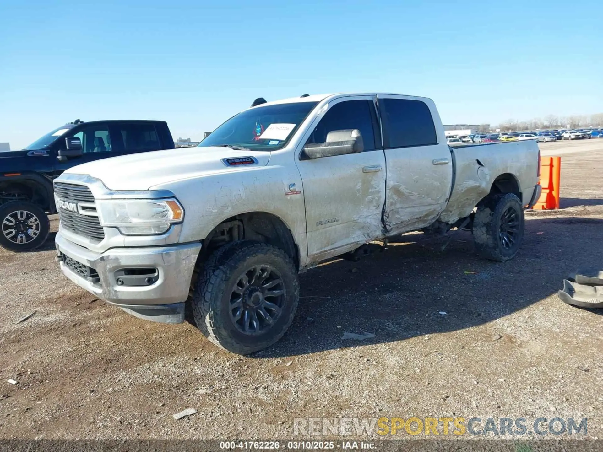 2 Photograph of a damaged car 3C6UR5DL9KG625821 RAM 2500 2019