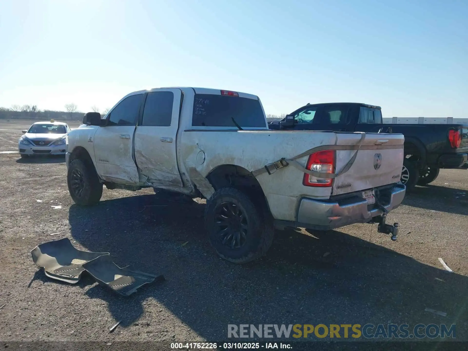 3 Photograph of a damaged car 3C6UR5DL9KG625821 RAM 2500 2019