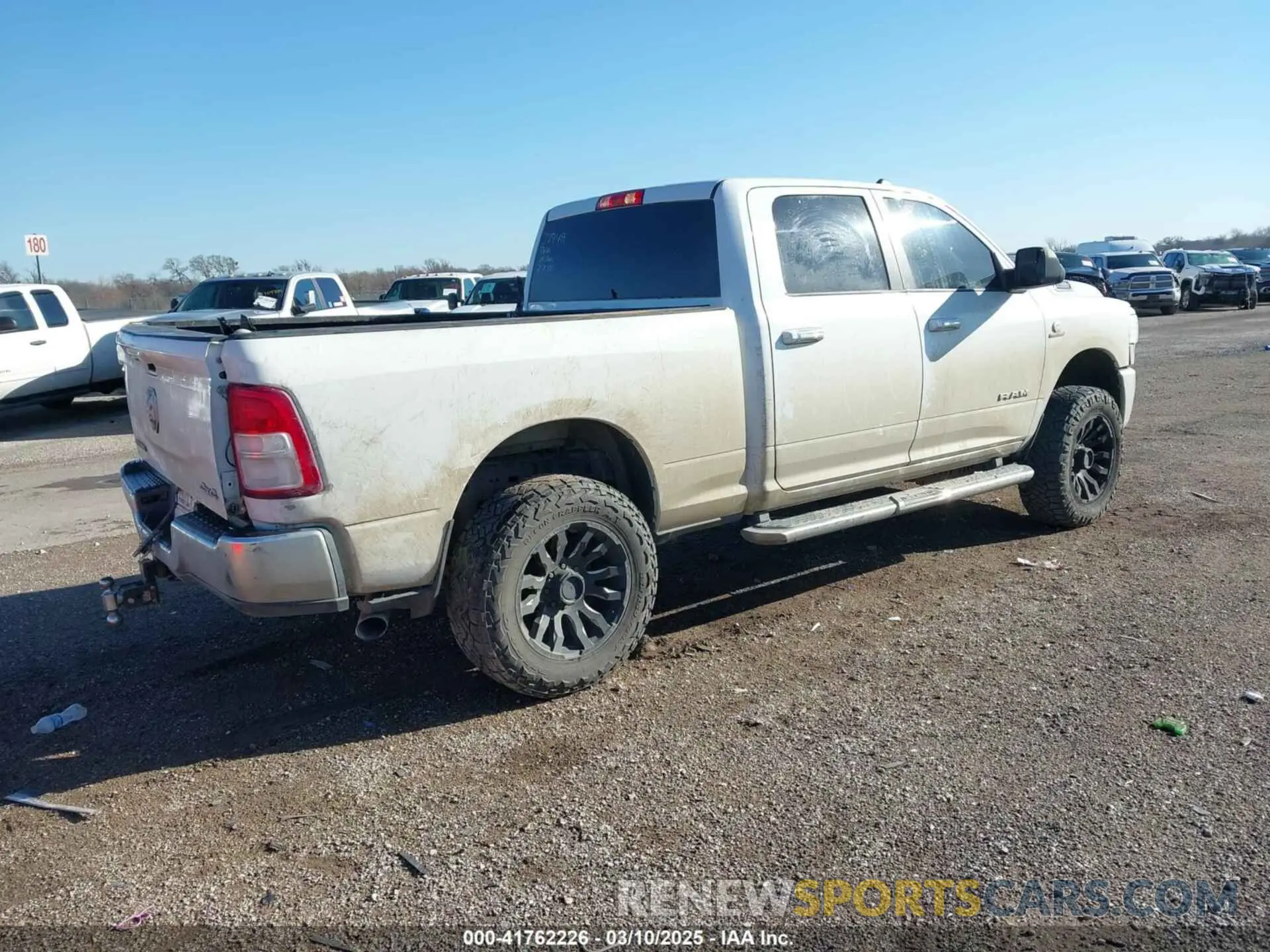 4 Photograph of a damaged car 3C6UR5DL9KG625821 RAM 2500 2019