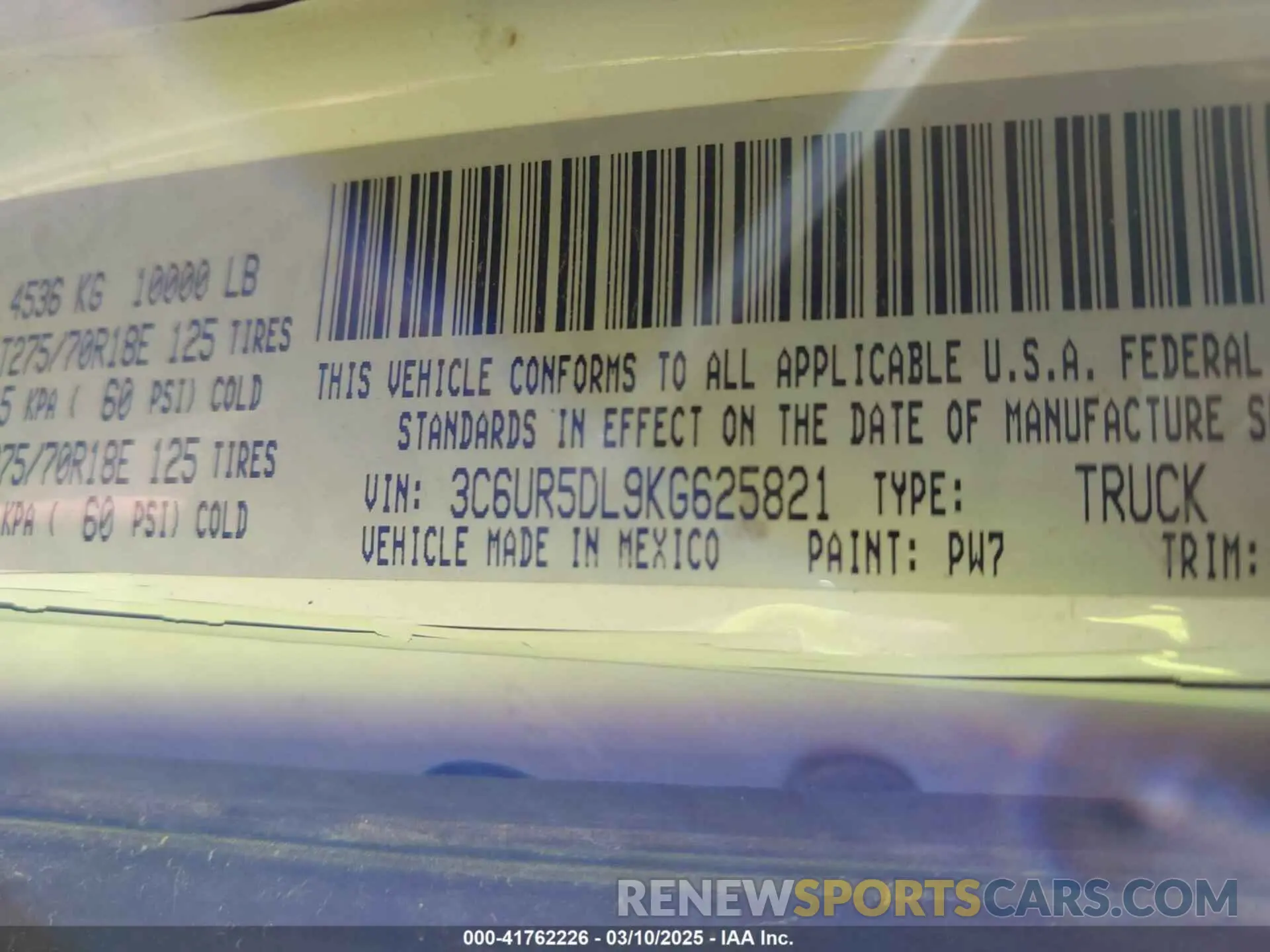 9 Photograph of a damaged car 3C6UR5DL9KG625821 RAM 2500 2019