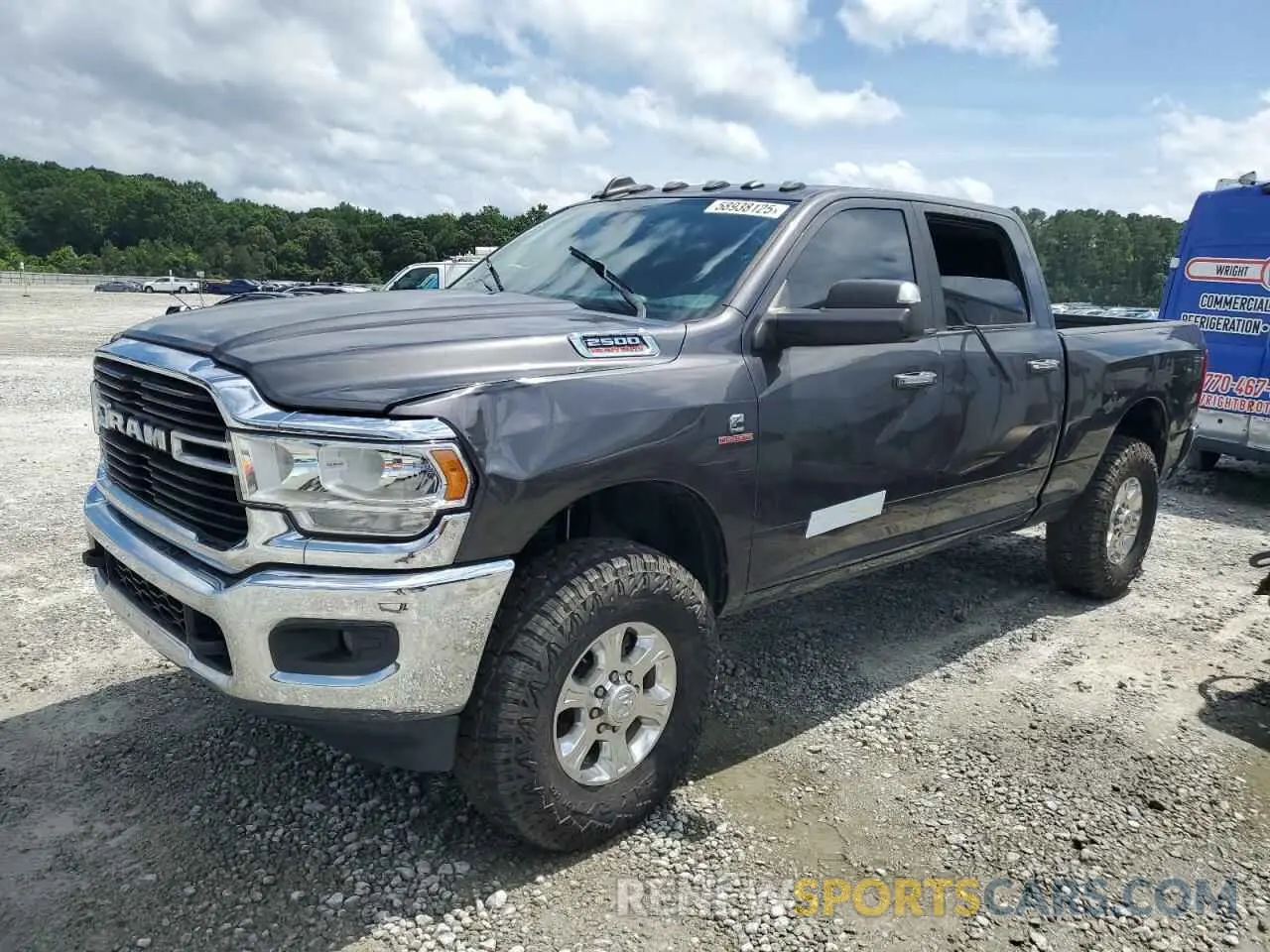 1 Photograph of a damaged car 3C6UR5DLXKG634415 RAM 2500 2019