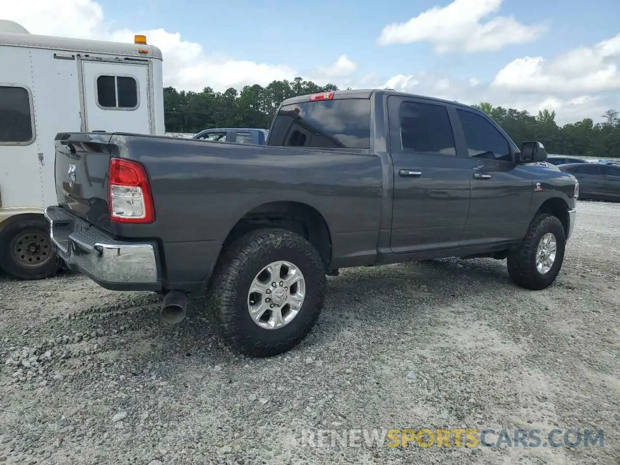 3 Photograph of a damaged car 3C6UR5DLXKG634415 RAM 2500 2019