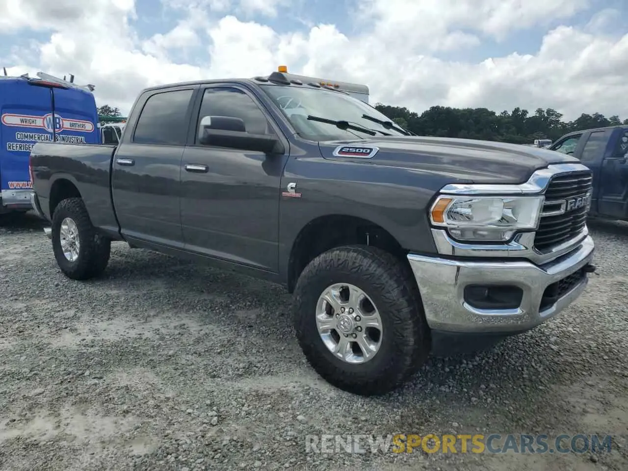 4 Photograph of a damaged car 3C6UR5DLXKG634415 RAM 2500 2019