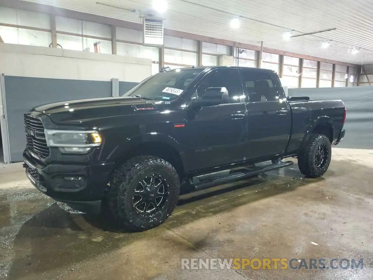 1 Photograph of a damaged car 3C6UR5FJ0KG722093 RAM 2500 2019