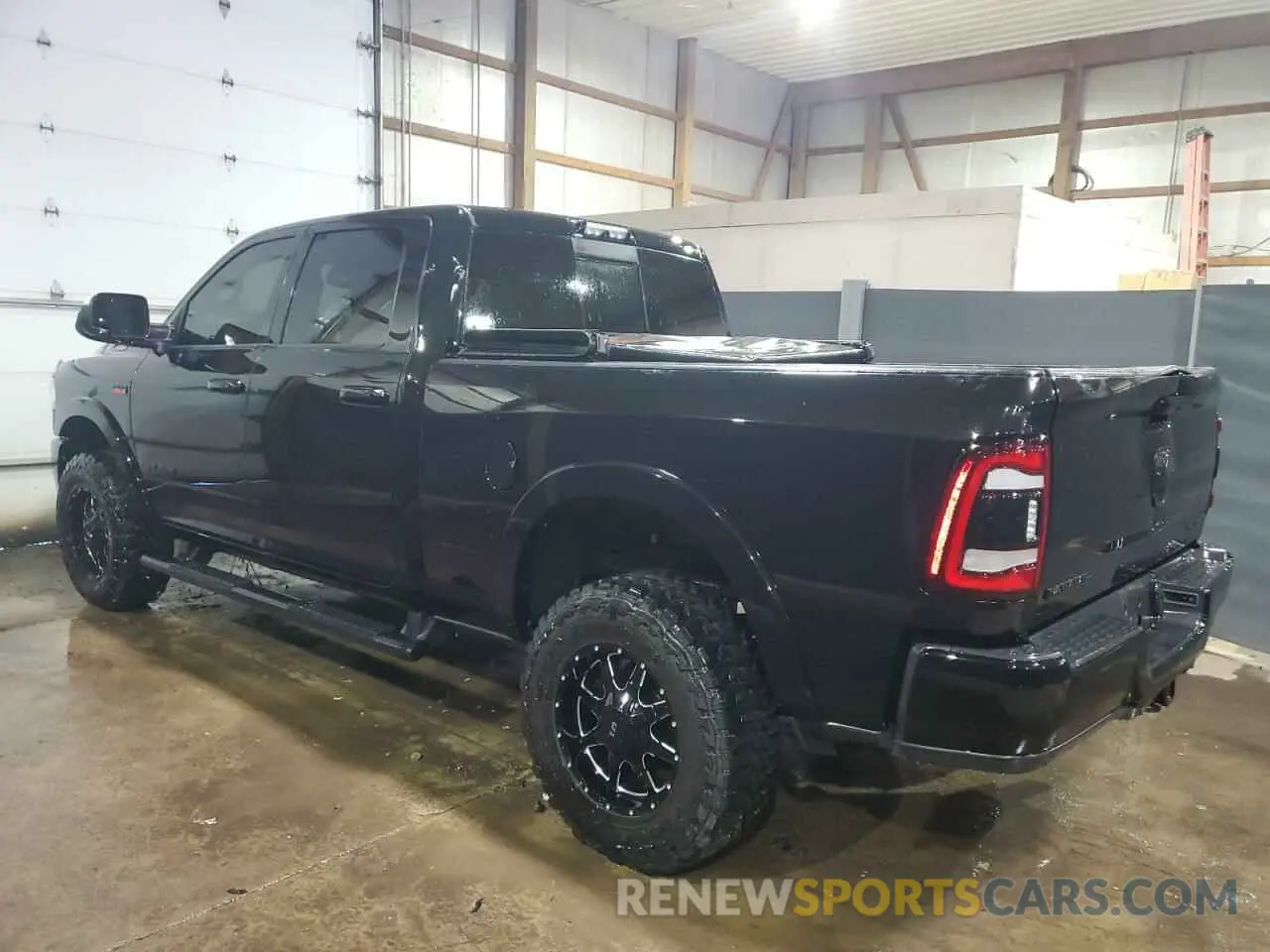 2 Photograph of a damaged car 3C6UR5FJ0KG722093 RAM 2500 2019