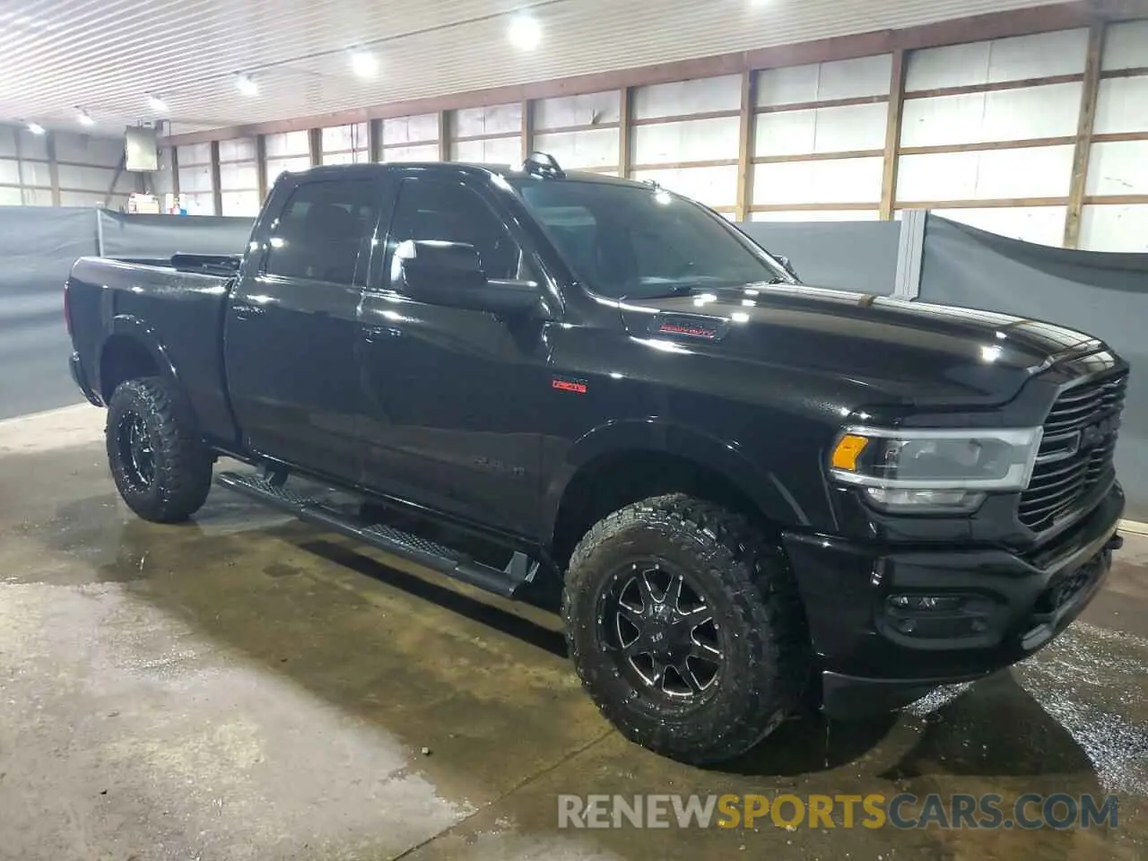 4 Photograph of a damaged car 3C6UR5FJ0KG722093 RAM 2500 2019
