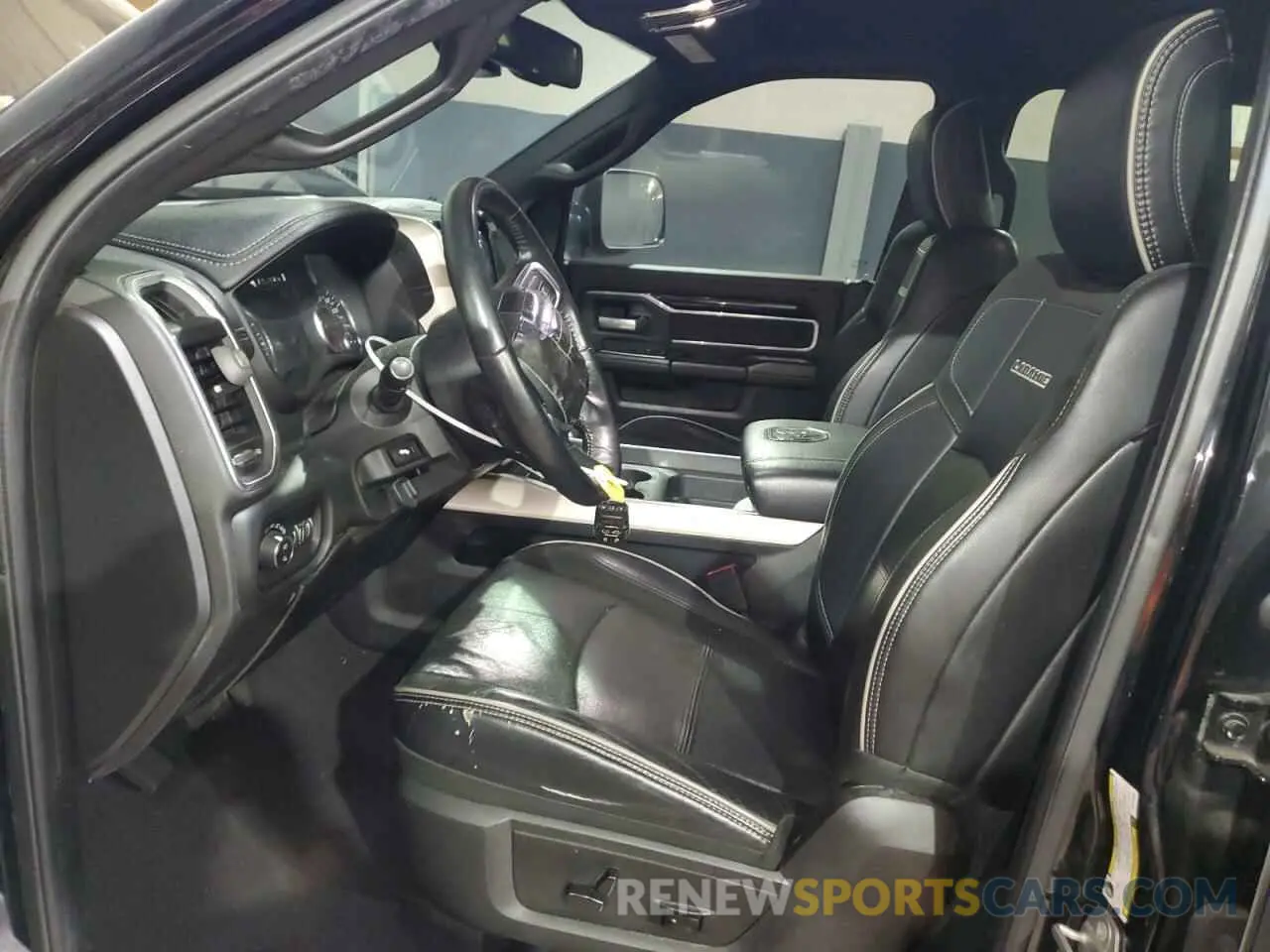 7 Photograph of a damaged car 3C6UR5FJ0KG722093 RAM 2500 2019