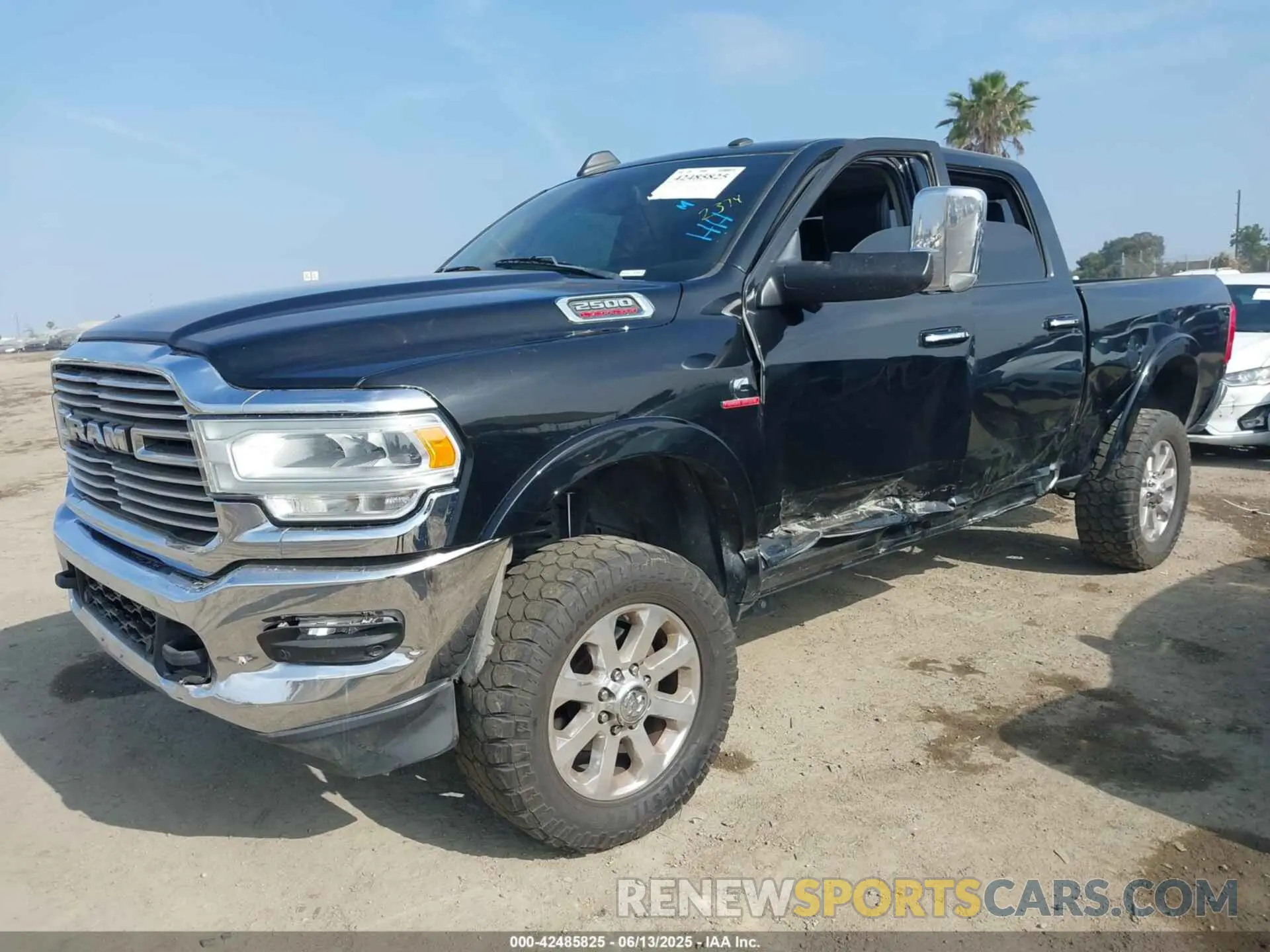 2 Photograph of a damaged car 3C6UR5FL0KG613778 RAM 2500 2019