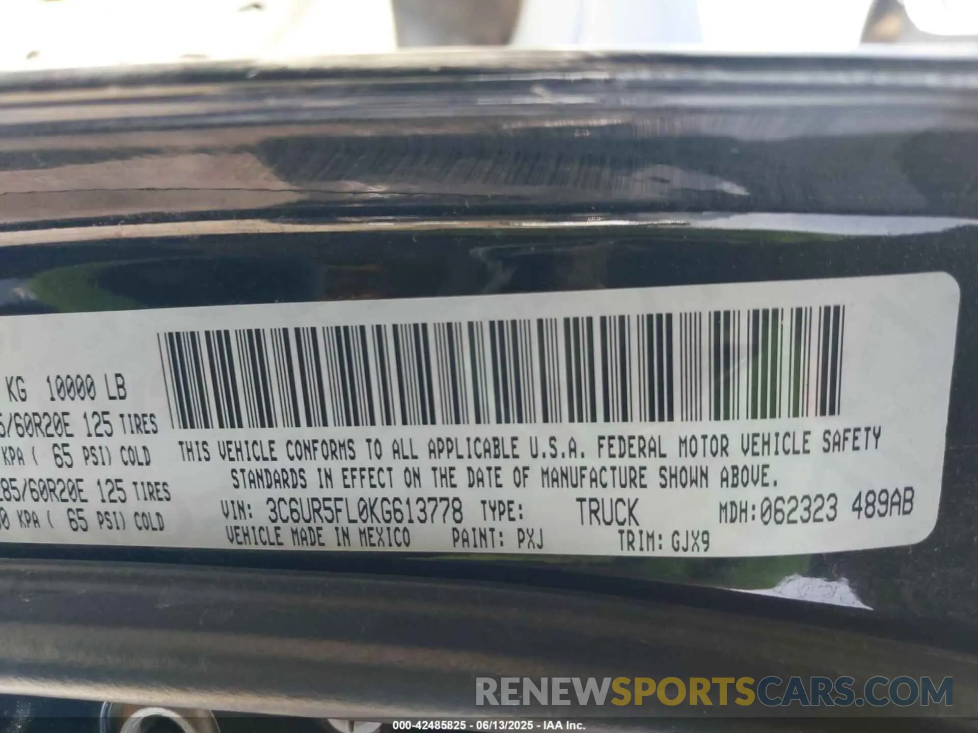 9 Photograph of a damaged car 3C6UR5FL0KG613778 RAM 2500 2019
