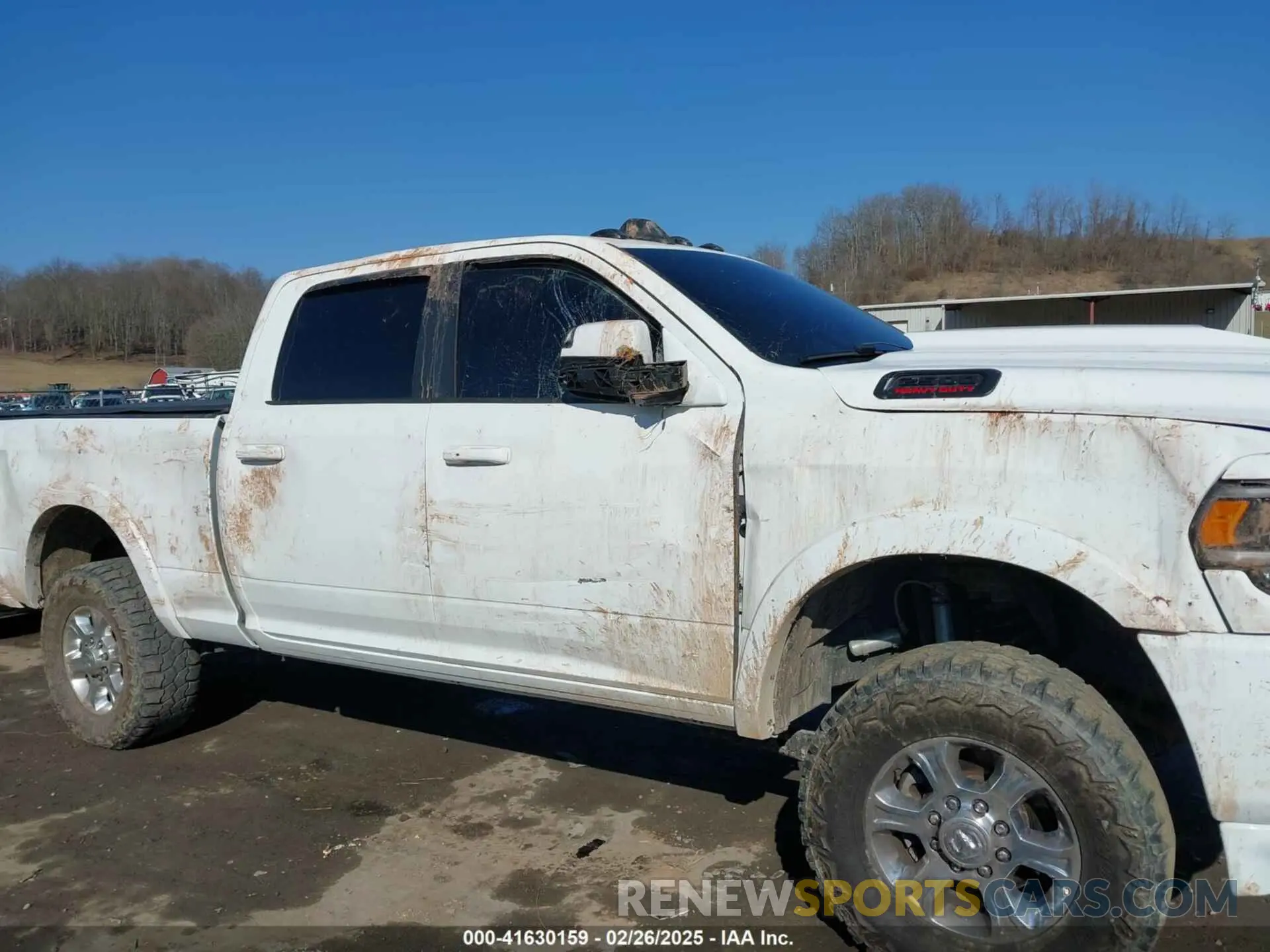 13 Photograph of a damaged car 3C6UR5FL0KG714111 RAM 2500 2019