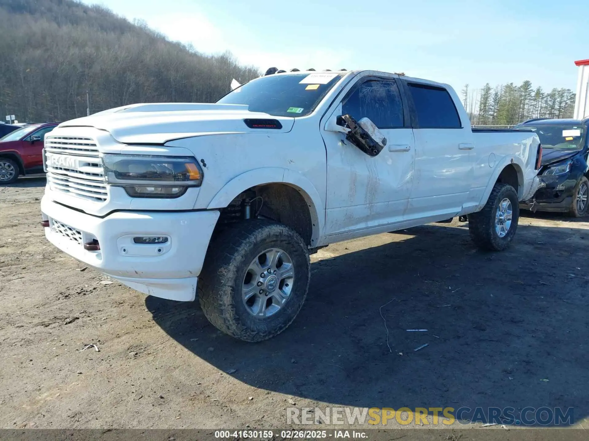2 Photograph of a damaged car 3C6UR5FL0KG714111 RAM 2500 2019
