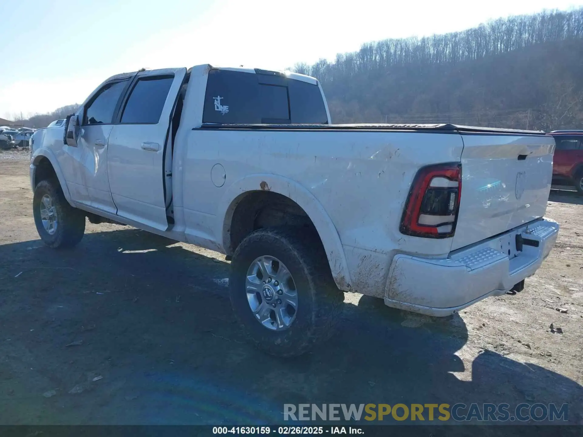 3 Photograph of a damaged car 3C6UR5FL0KG714111 RAM 2500 2019