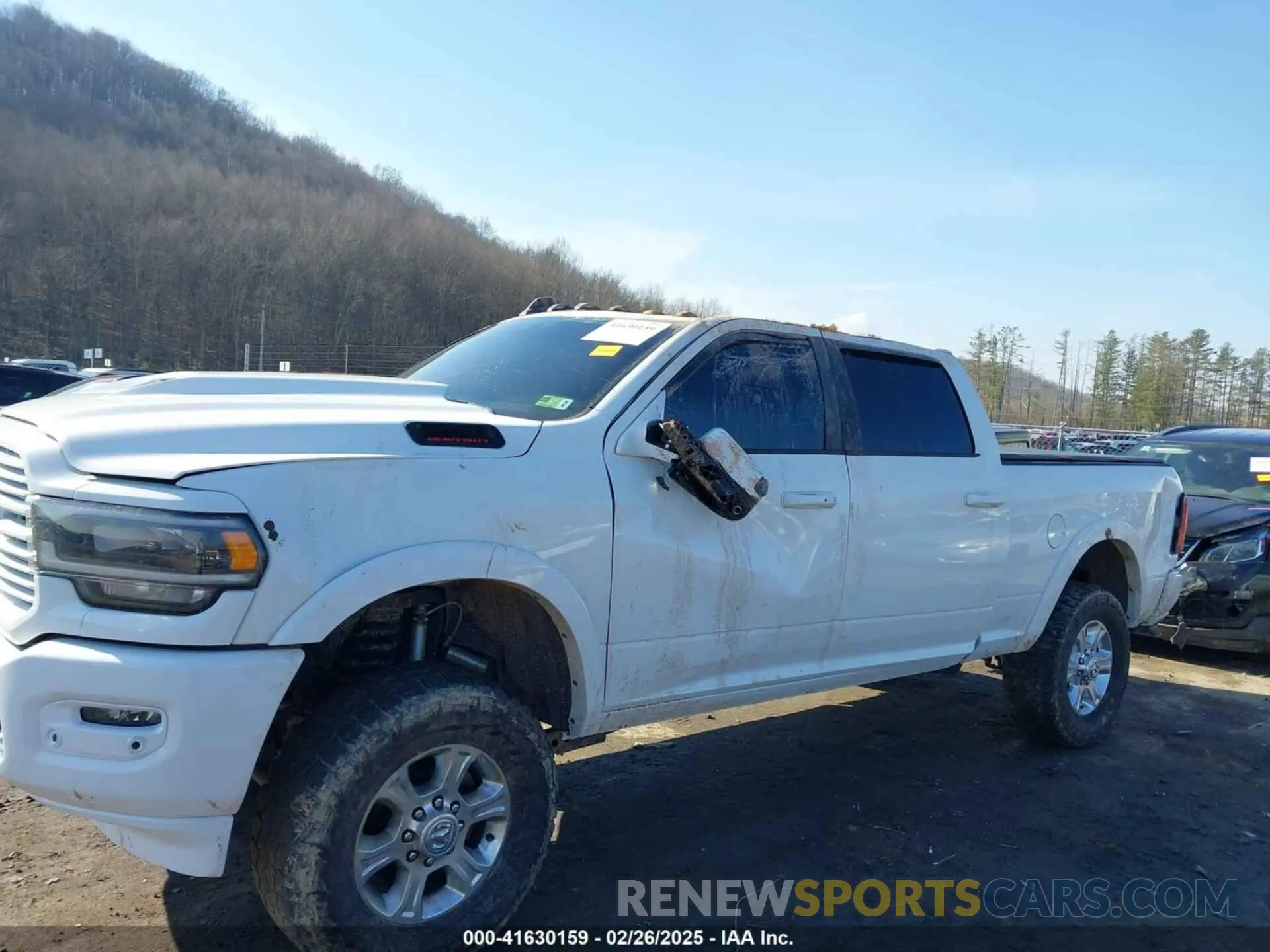 6 Photograph of a damaged car 3C6UR5FL0KG714111 RAM 2500 2019