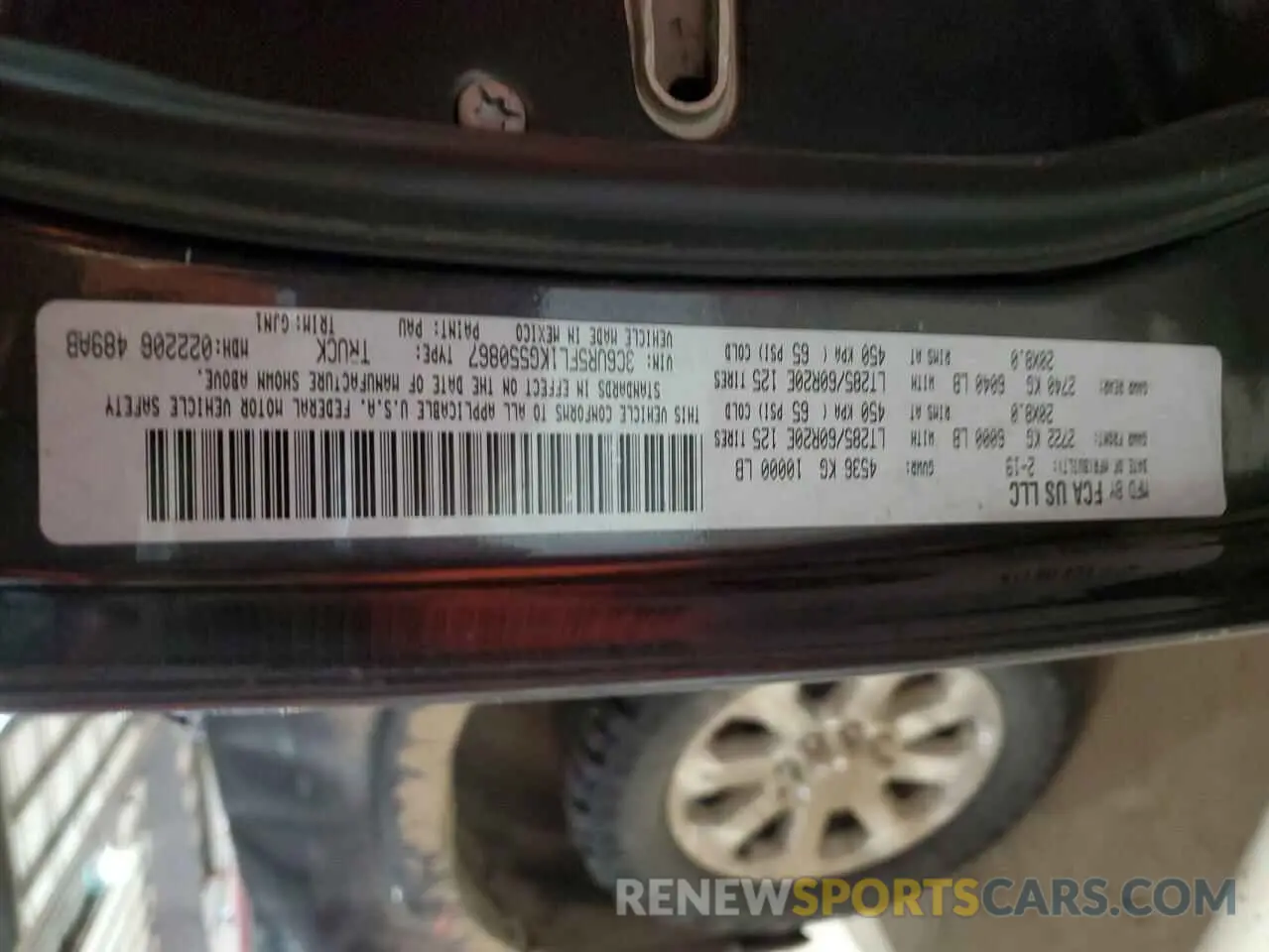 12 Photograph of a damaged car 3C6UR5FL1KG550867 RAM 2500 2019