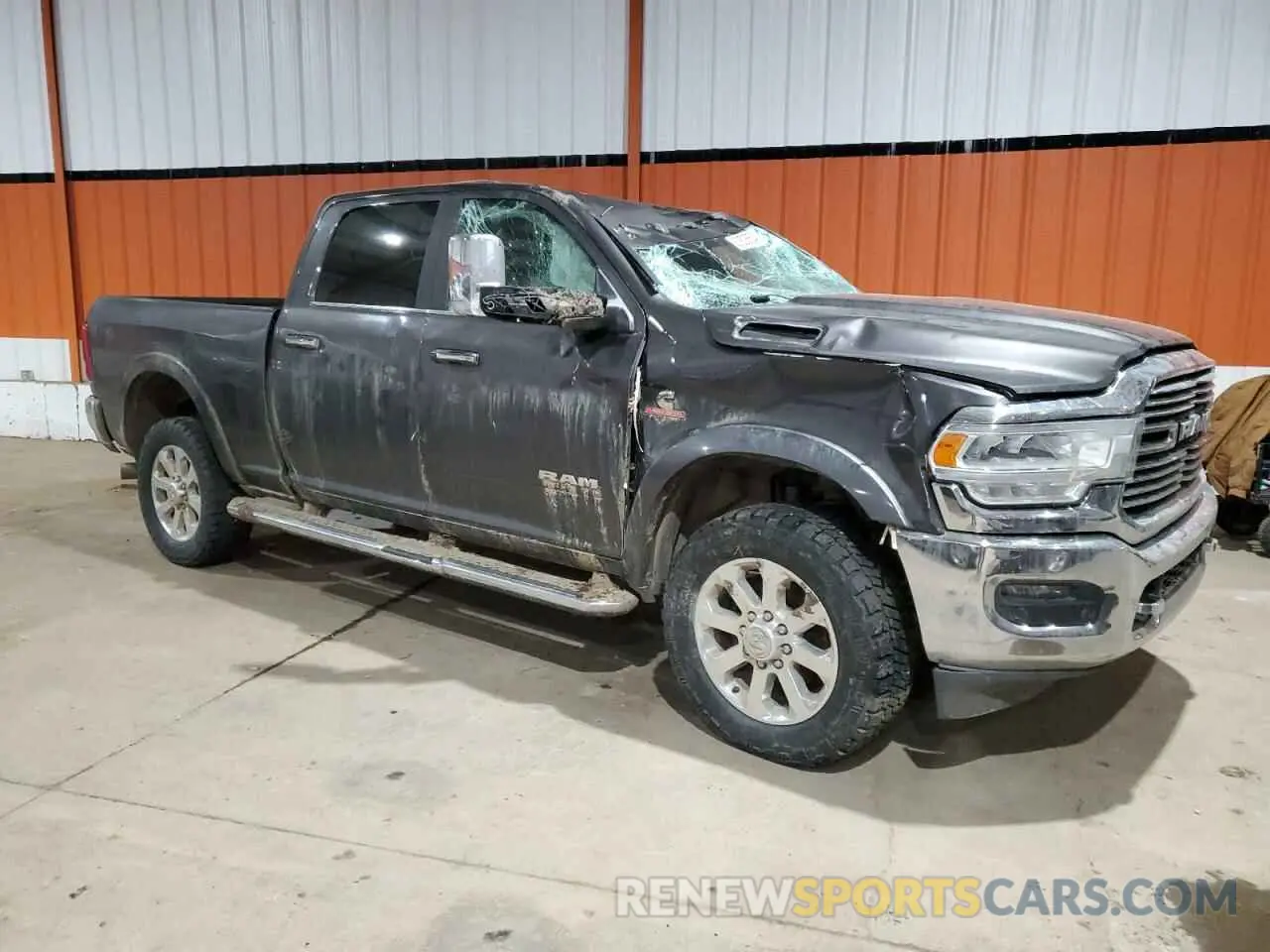 4 Photograph of a damaged car 3C6UR5FL1KG550867 RAM 2500 2019