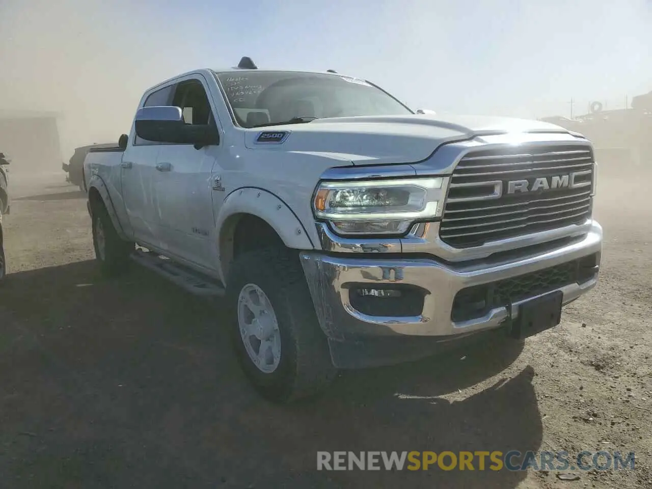 4 Photograph of a damaged car 3C6UR5FL1KG657255 RAM 2500 2019