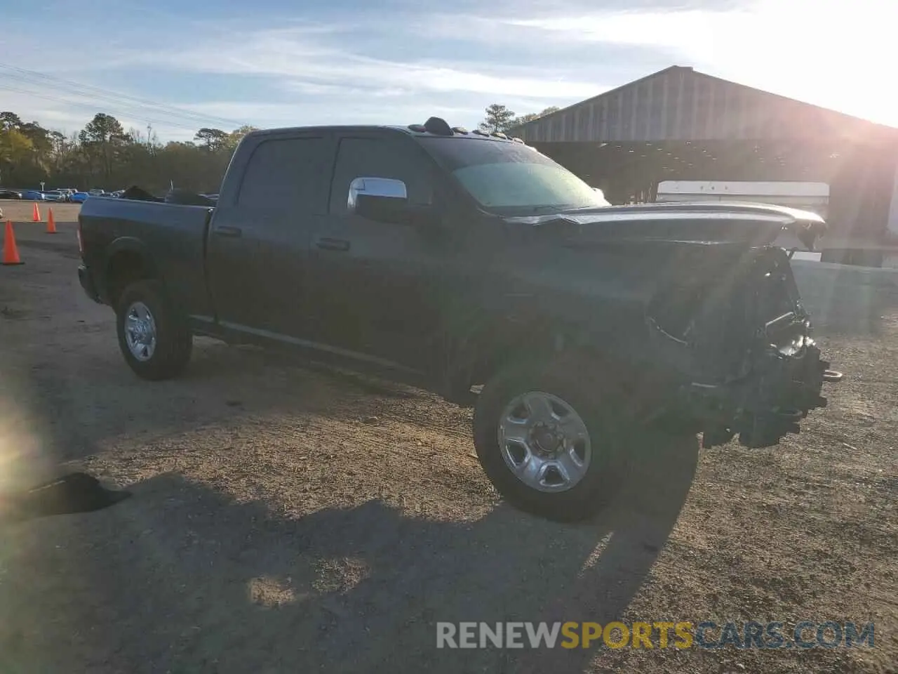 4 Photograph of a damaged car 3C6UR5FL2KG652677 RAM 2500 2019