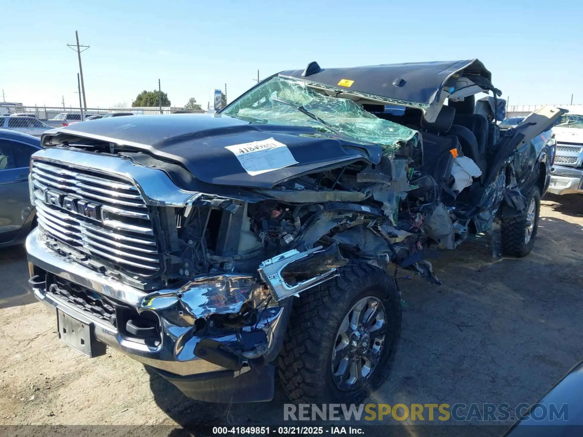 2 Photograph of a damaged car 3C6UR5FL3KG595244 RAM 2500 2019
