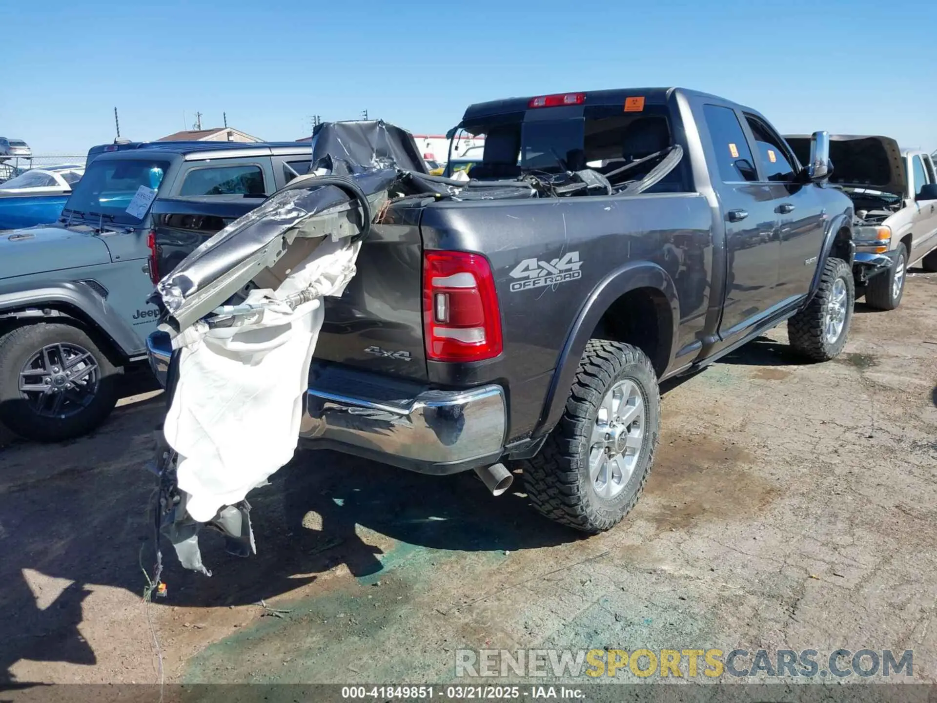 4 Photograph of a damaged car 3C6UR5FL3KG595244 RAM 2500 2019