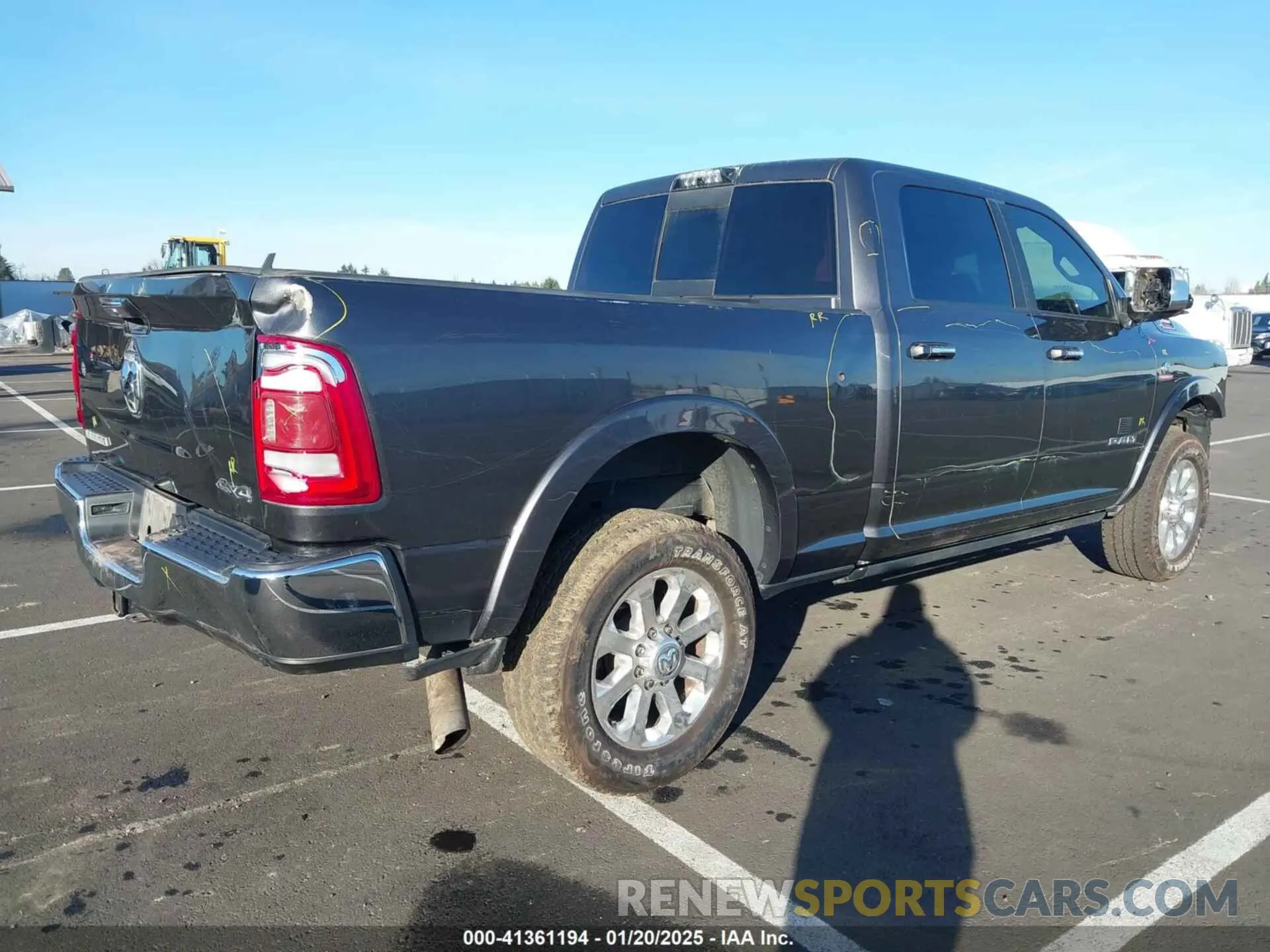 4 Photograph of a damaged car 3C6UR5FL5KG546188 RAM 2500 2019
