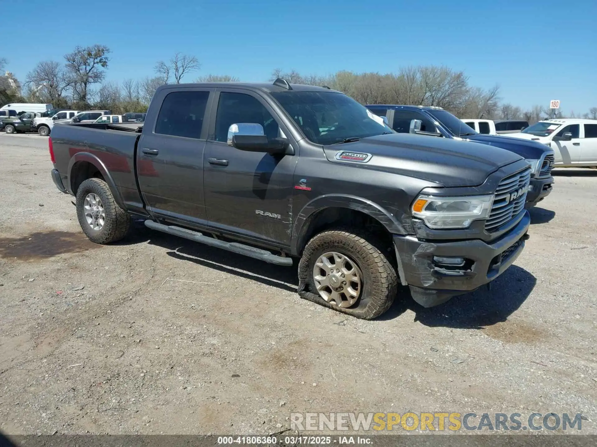 1 Photograph of a damaged car 3C6UR5FL7KG521132 RAM 2500 2019