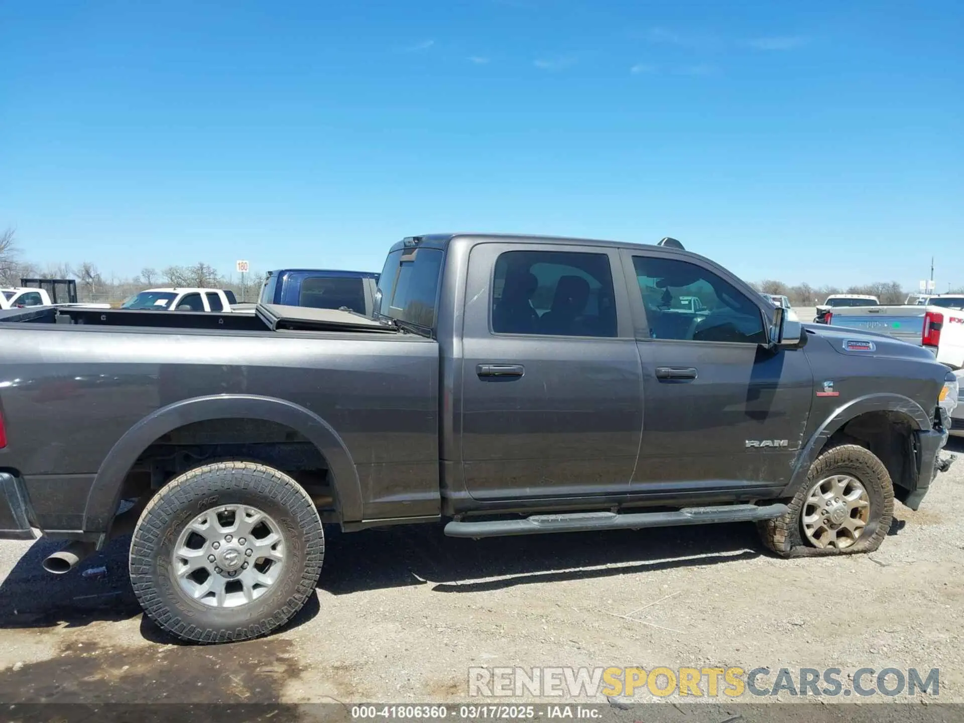 13 Photograph of a damaged car 3C6UR5FL7KG521132 RAM 2500 2019