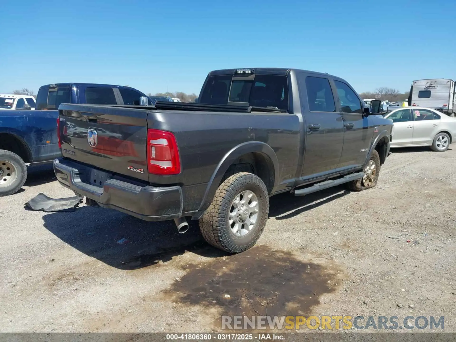4 Photograph of a damaged car 3C6UR5FL7KG521132 RAM 2500 2019