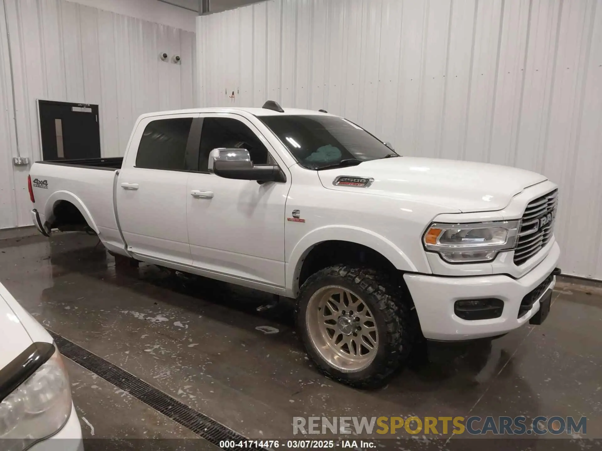 1 Photograph of a damaged car 3C6UR5FL7KG657180 RAM 2500 2019