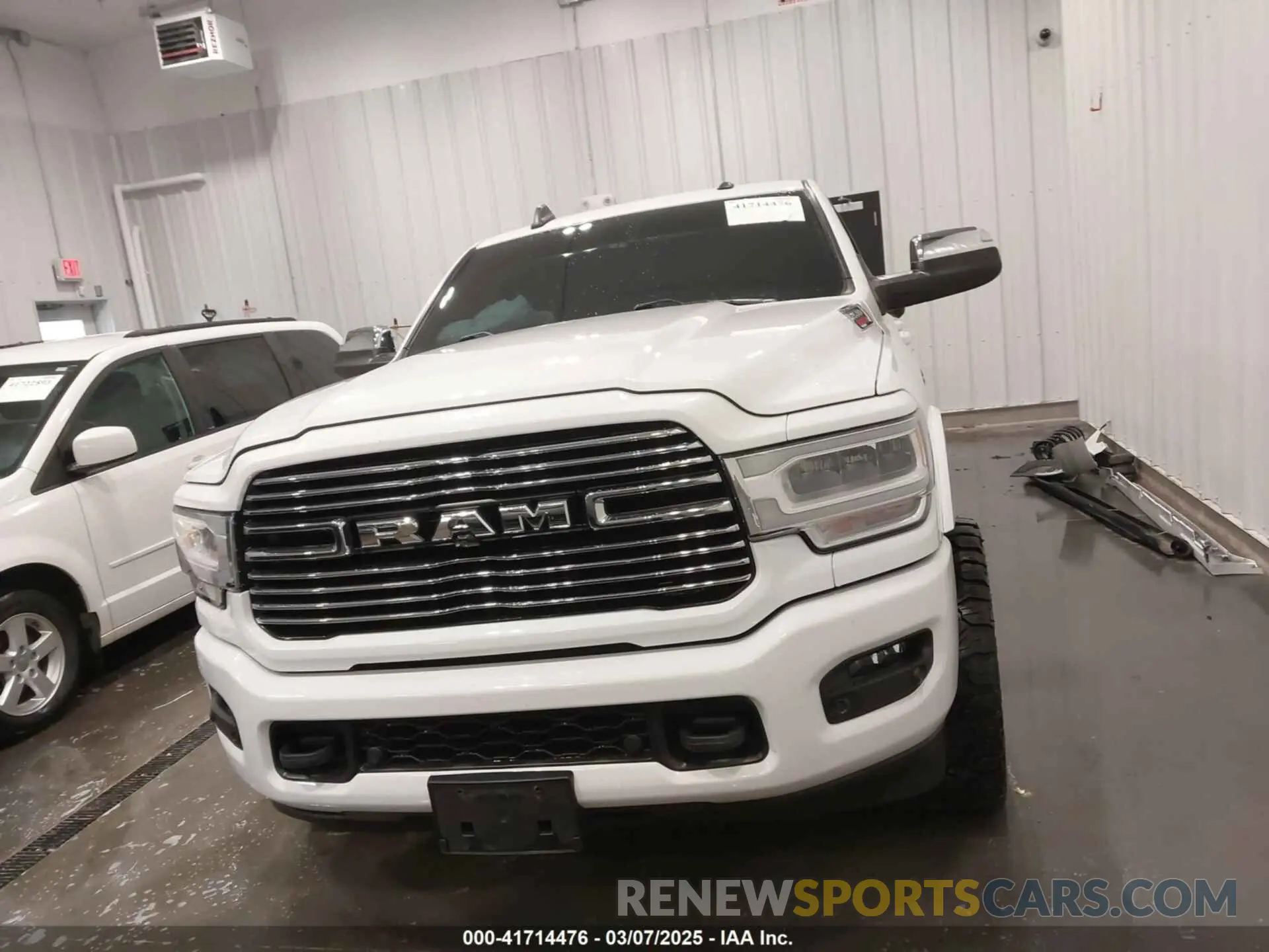 13 Photograph of a damaged car 3C6UR5FL7KG657180 RAM 2500 2019