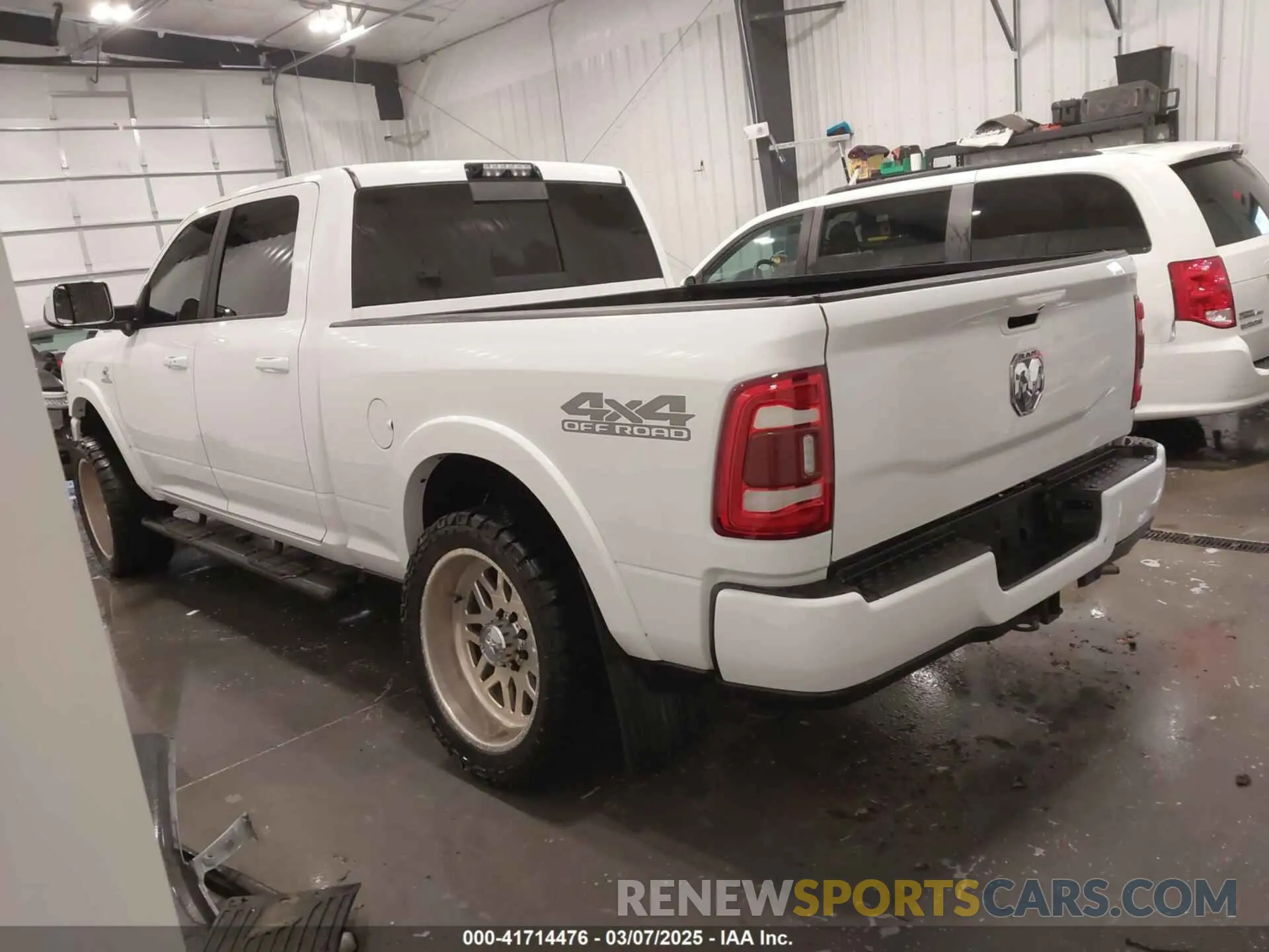 3 Photograph of a damaged car 3C6UR5FL7KG657180 RAM 2500 2019