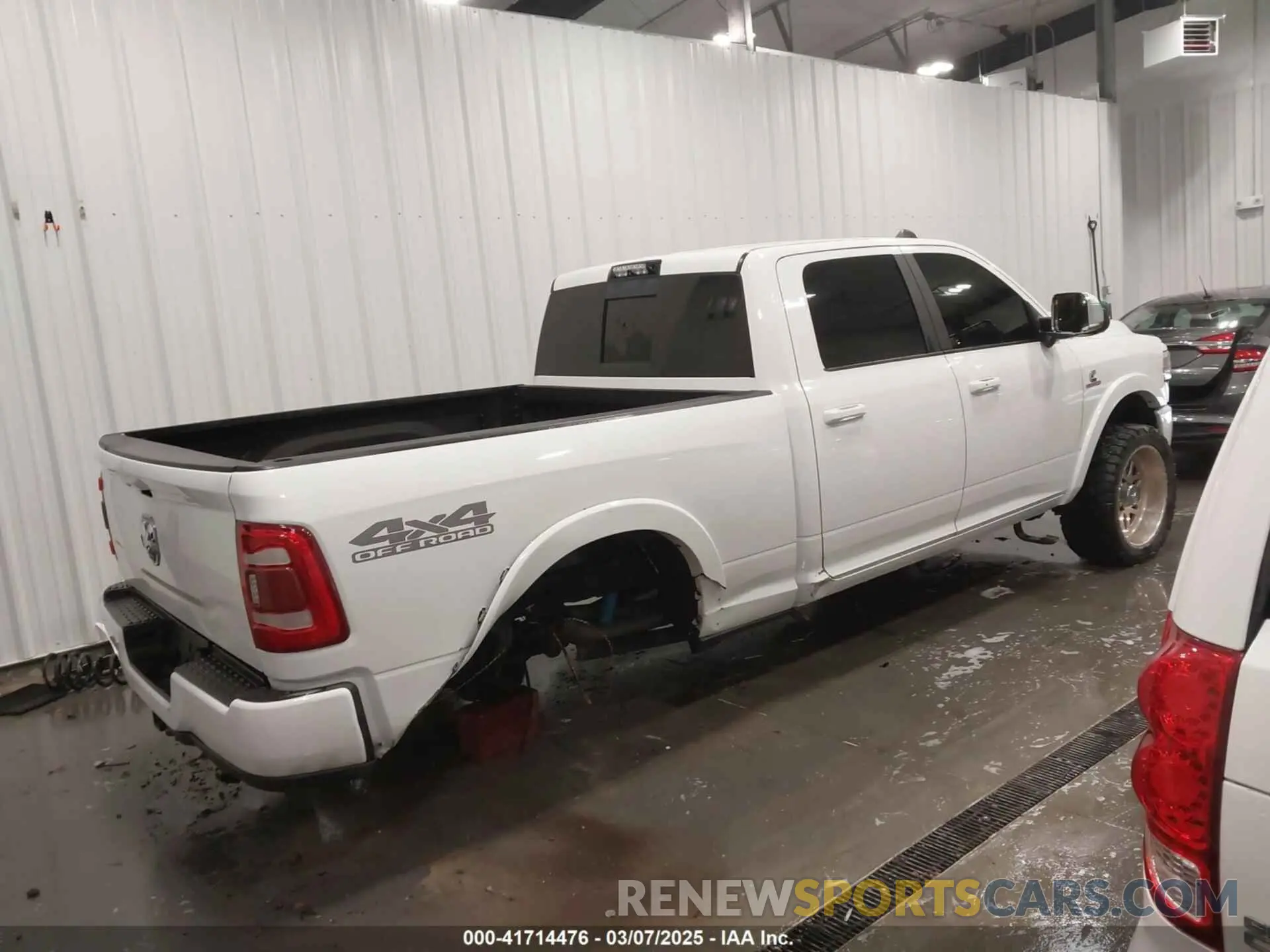 4 Photograph of a damaged car 3C6UR5FL7KG657180 RAM 2500 2019