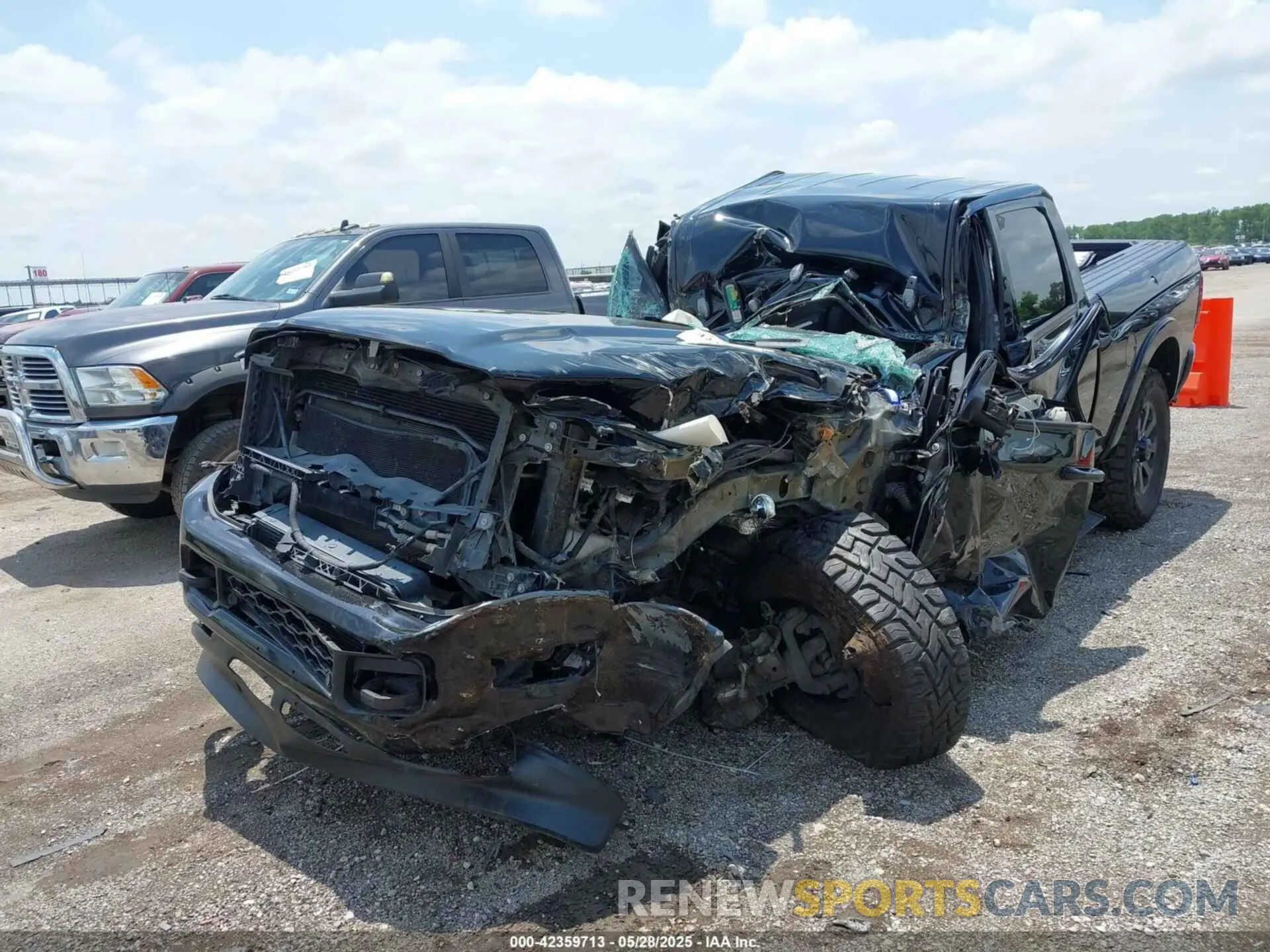 2 Photograph of a damaged car 3C6UR5FL8KG701641 RAM 2500 2019