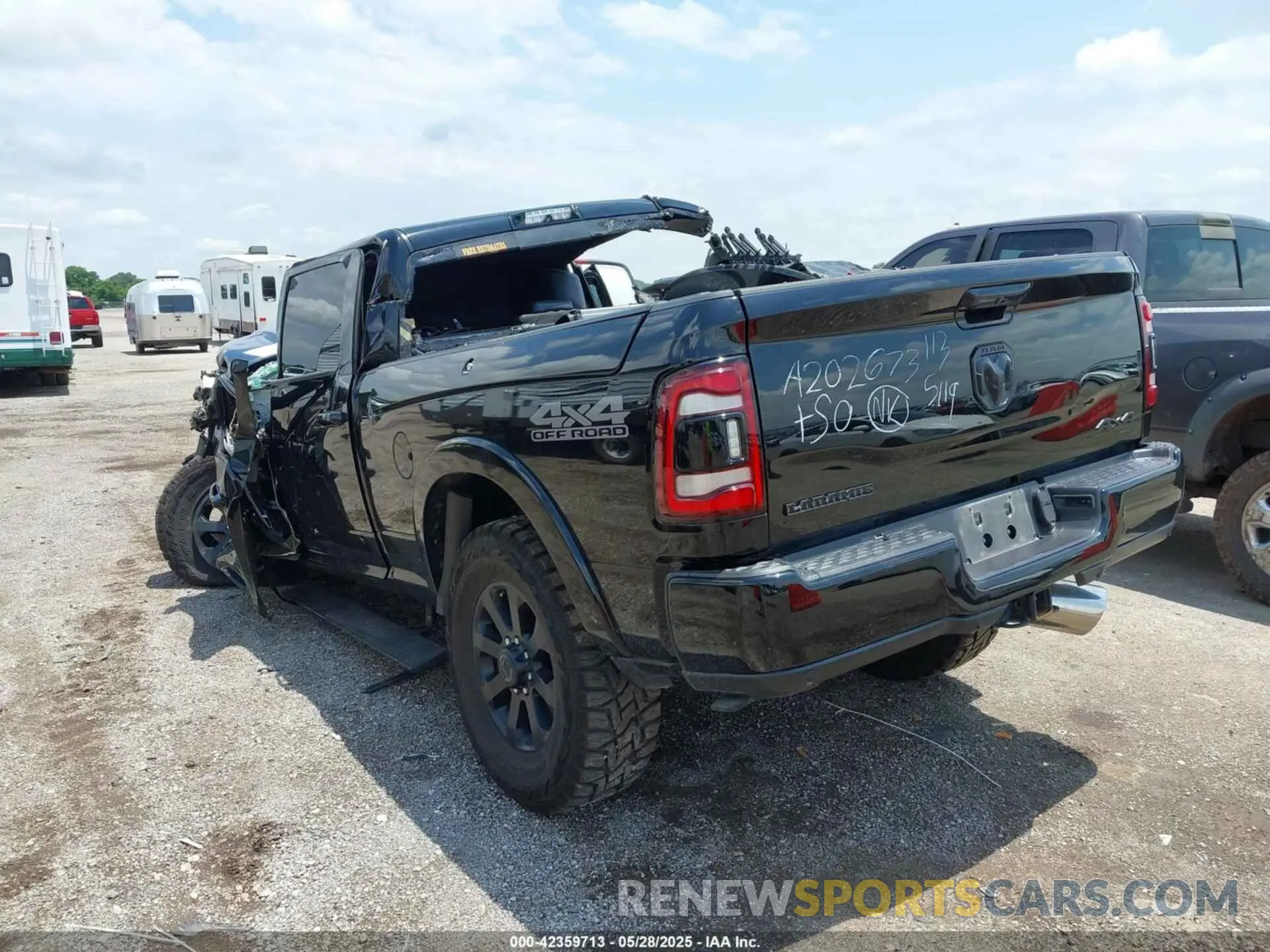 3 Photograph of a damaged car 3C6UR5FL8KG701641 RAM 2500 2019
