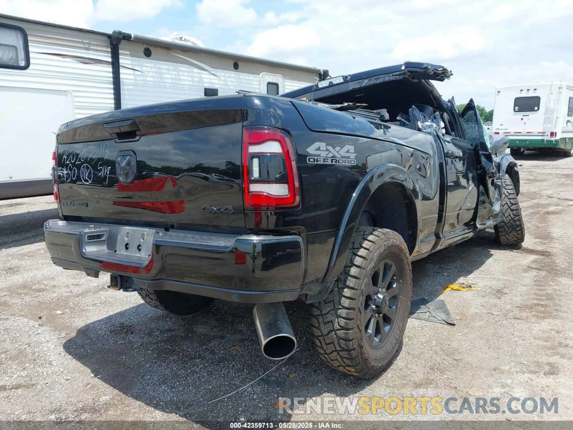 4 Photograph of a damaged car 3C6UR5FL8KG701641 RAM 2500 2019