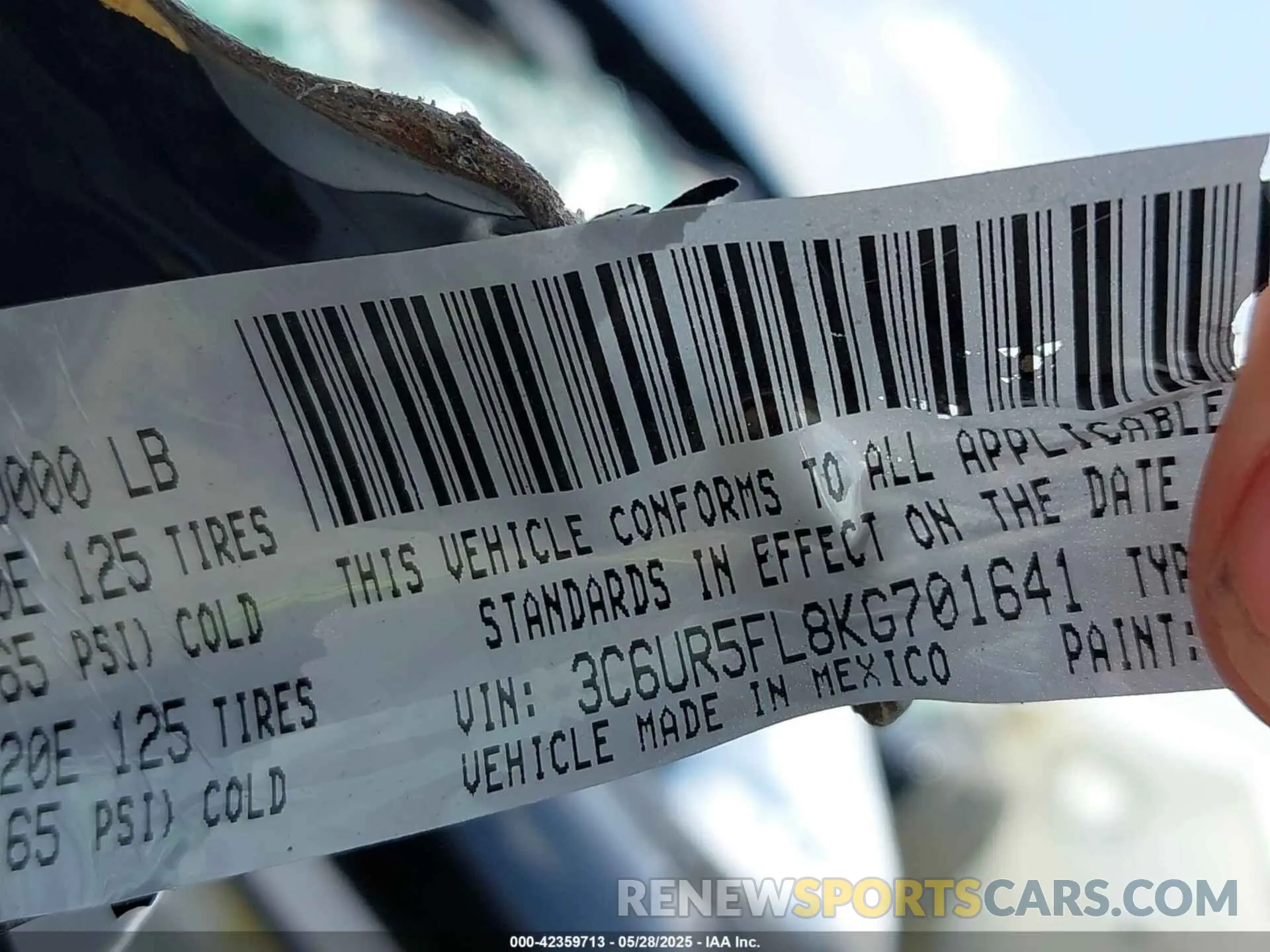 9 Photograph of a damaged car 3C6UR5FL8KG701641 RAM 2500 2019