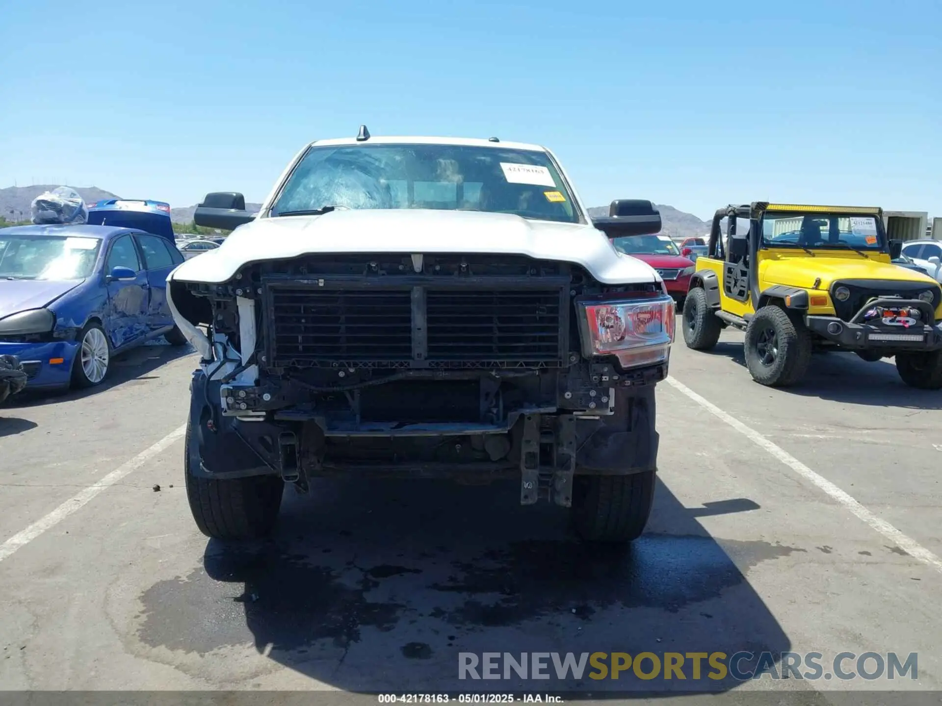 13 Photograph of a damaged car 3C6UR5HJ1KG599000 RAM 2500 2019
