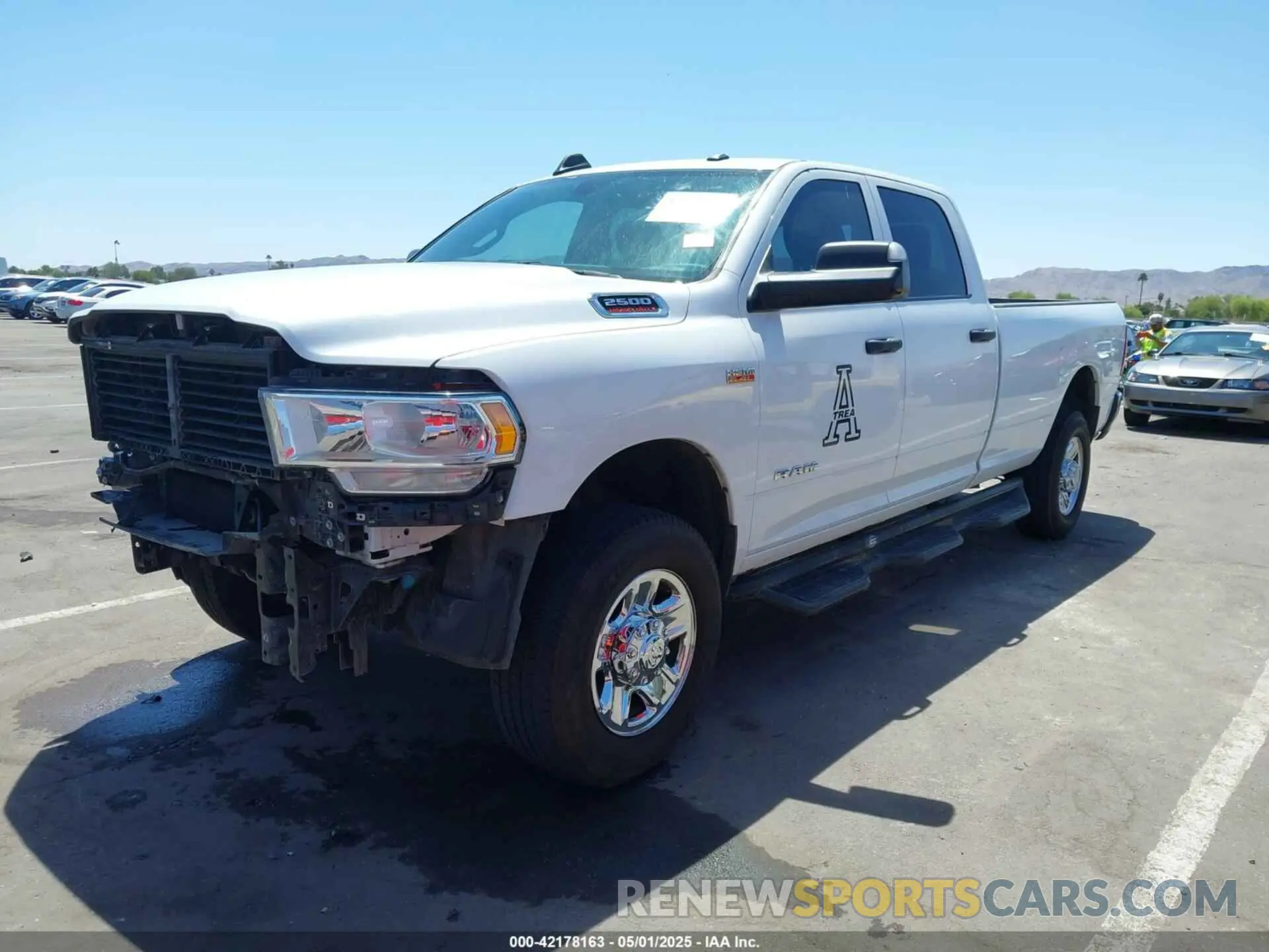 2 Photograph of a damaged car 3C6UR5HJ1KG599000 RAM 2500 2019