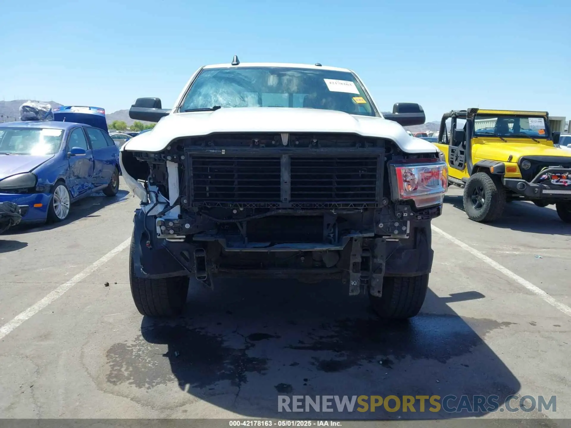 6 Photograph of a damaged car 3C6UR5HJ1KG599000 RAM 2500 2019