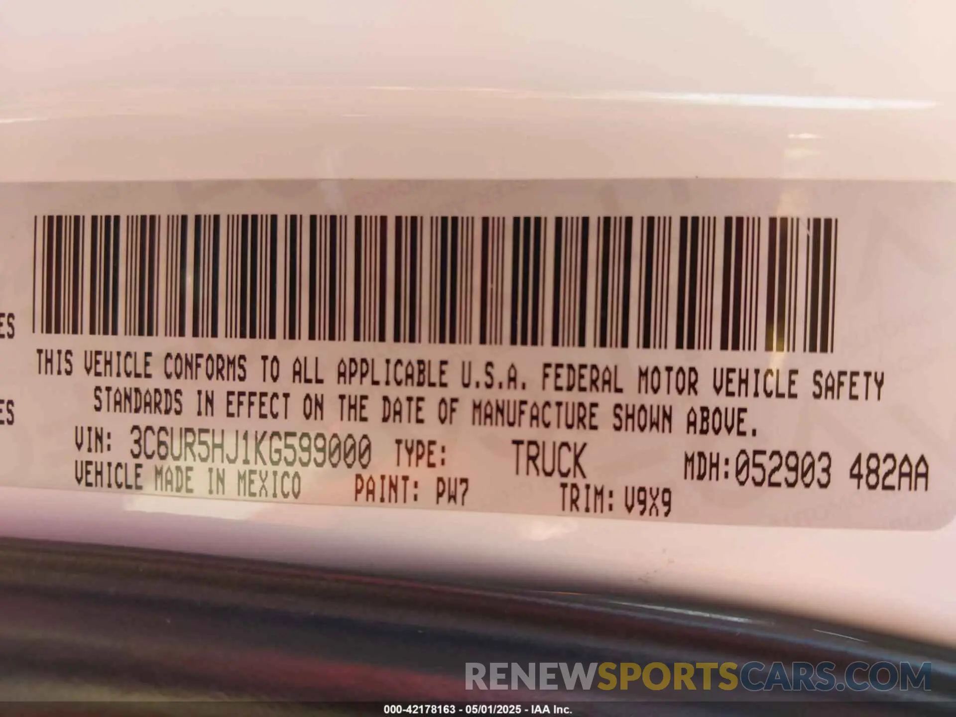 9 Photograph of a damaged car 3C6UR5HJ1KG599000 RAM 2500 2019
