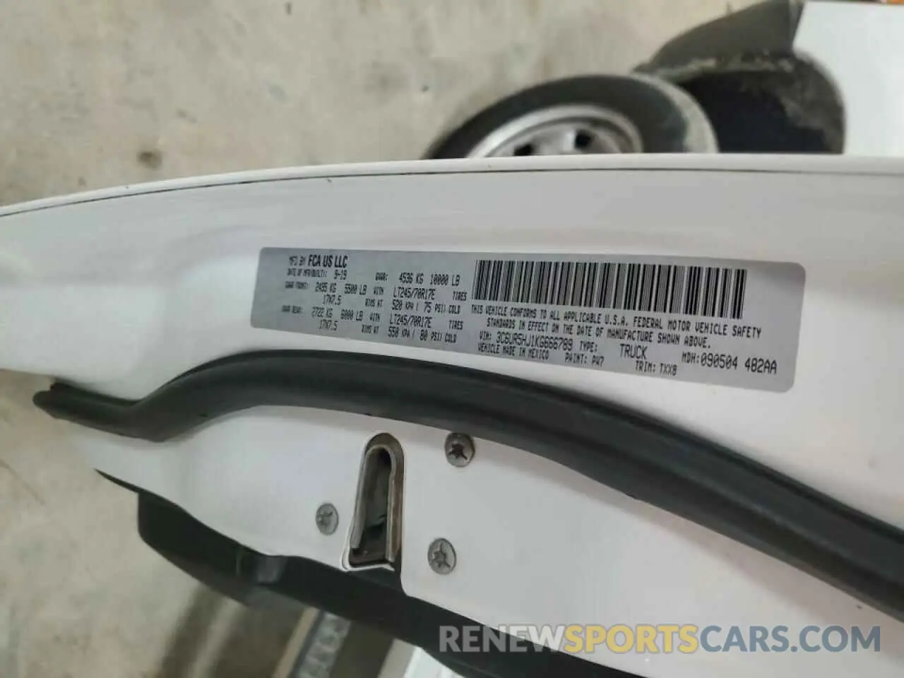 12 Photograph of a damaged car 3C6UR5HJ1KG666789 RAM 2500 2019