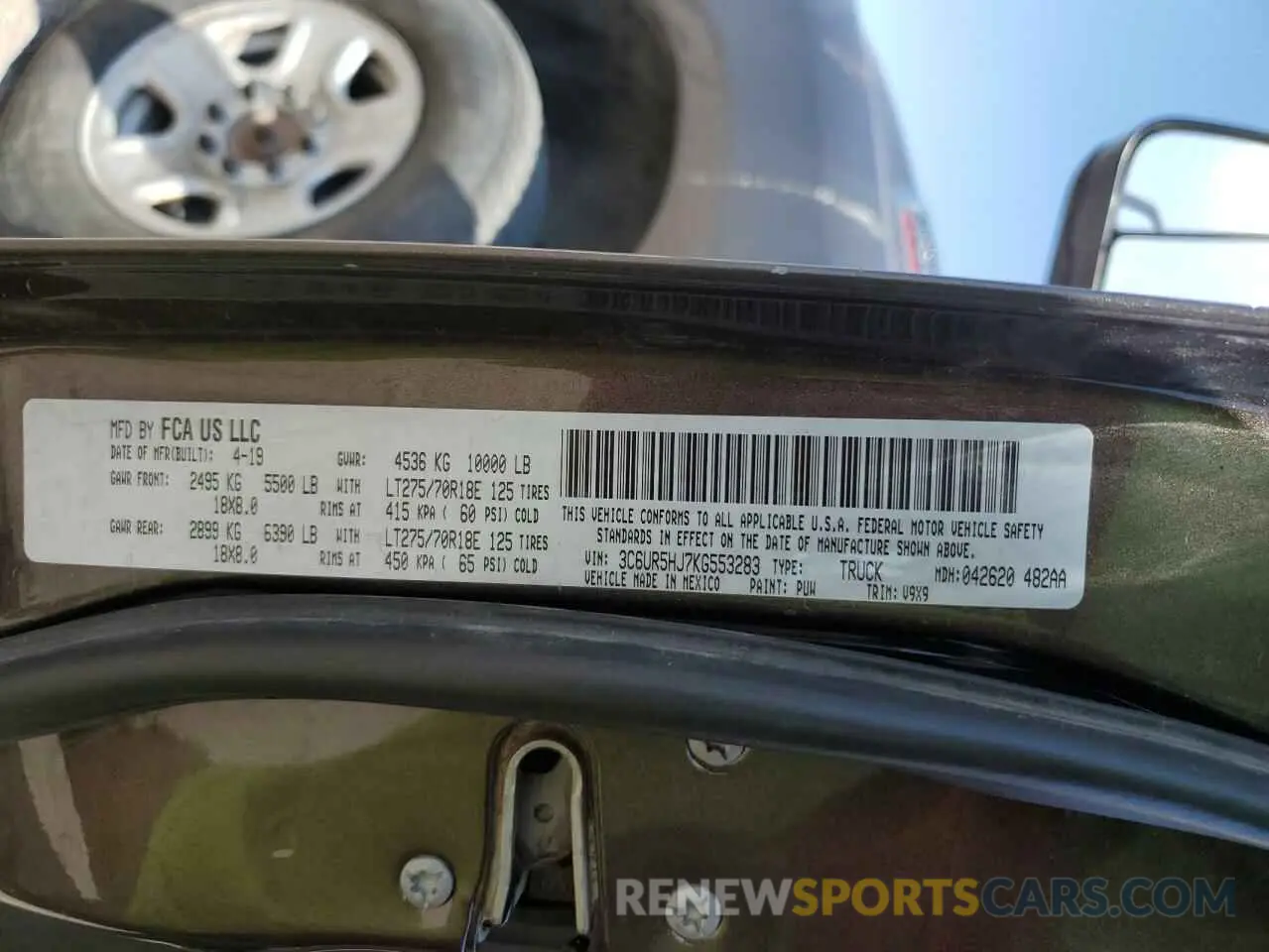13 Photograph of a damaged car 3C6UR5HJ7KG553283 RAM 2500 2019
