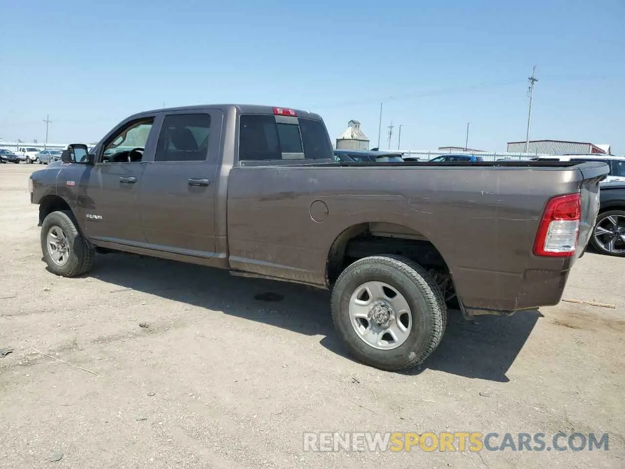 2 Photograph of a damaged car 3C6UR5HJ7KG553283 RAM 2500 2019