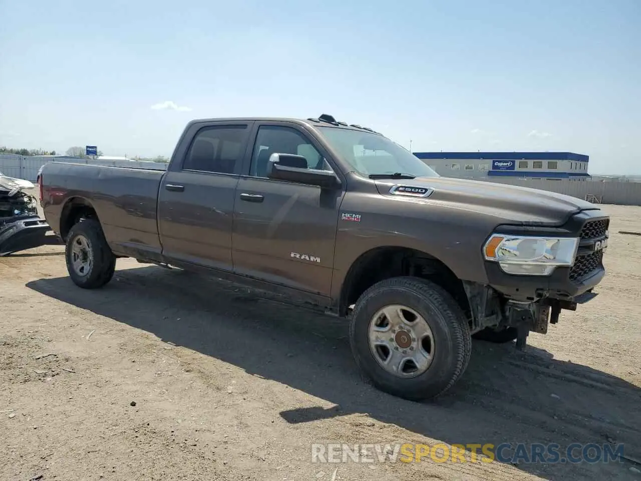 4 Photograph of a damaged car 3C6UR5HJ7KG553283 RAM 2500 2019
